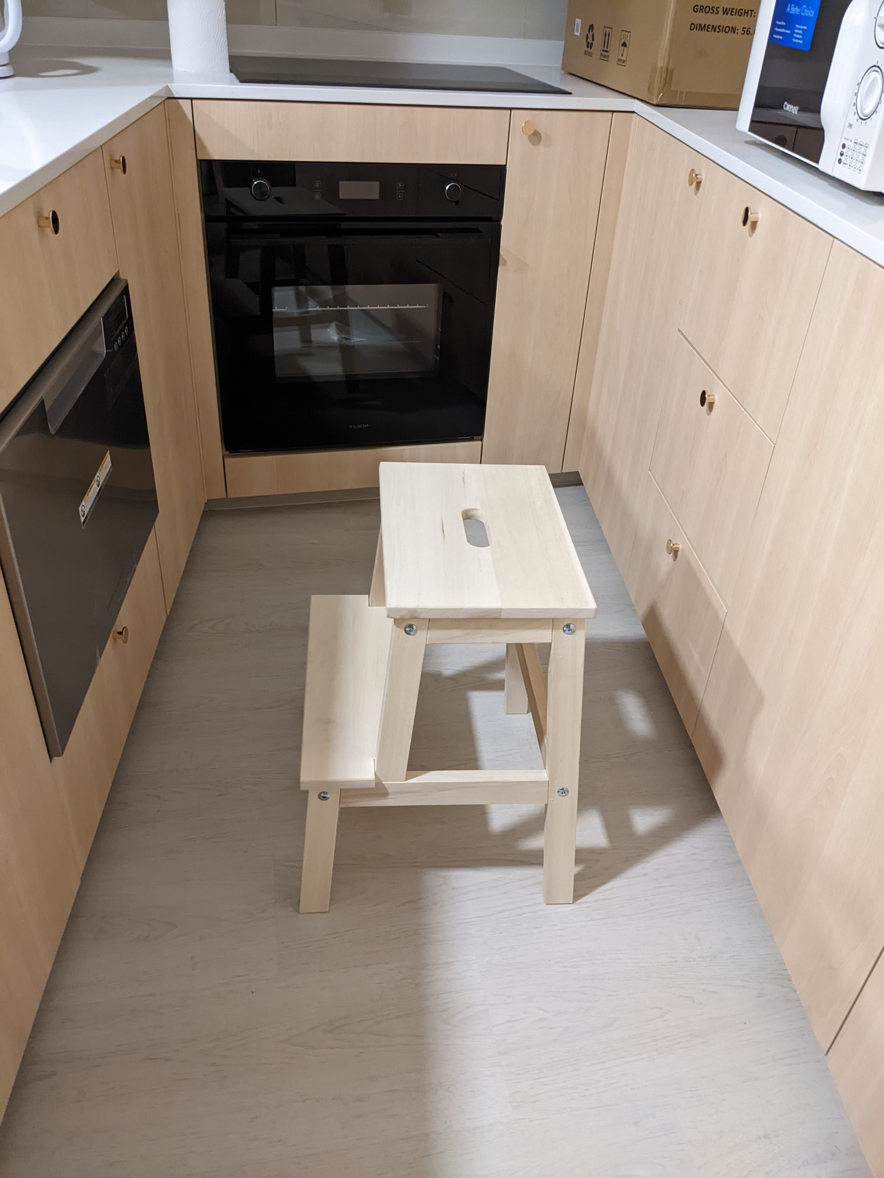 Customer home photo 18: Nice portable stool. Can comfortably sit or stand on it. Will be better if lacquered