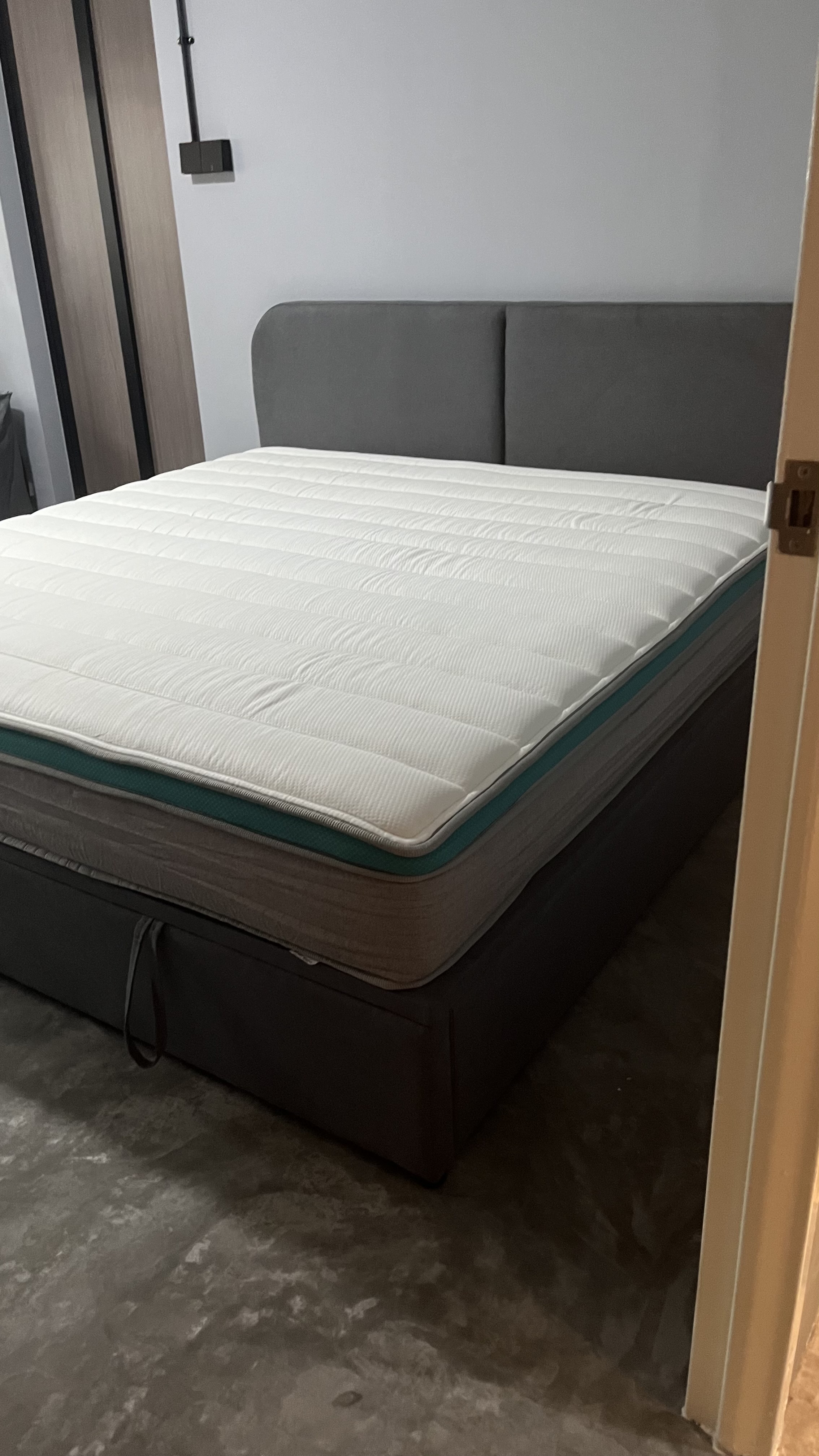 Customer home photo 7: Delivery came on time. Quality is really great. Definitely a huge space to put many things under. I don’t work out but pulling the bed up was easy and doesn’t require too much strength! Definitely recommend to get this bed frame!