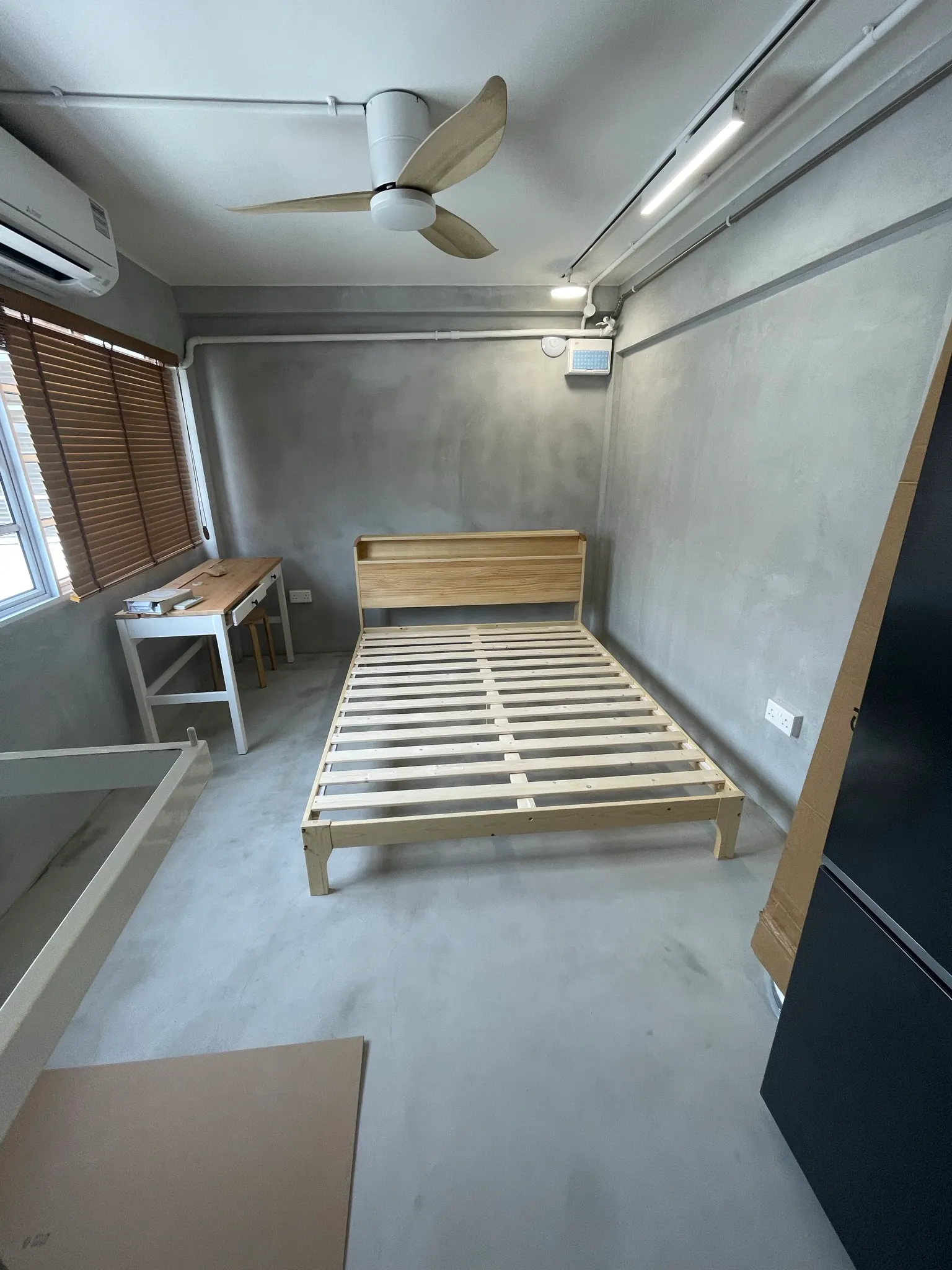 Customer home photo 4: Love the natural wood colour of it. Delivery was straightforward and they helped assemble it so it was really convenient. Seems pretty sturdy! Hope it lasts
