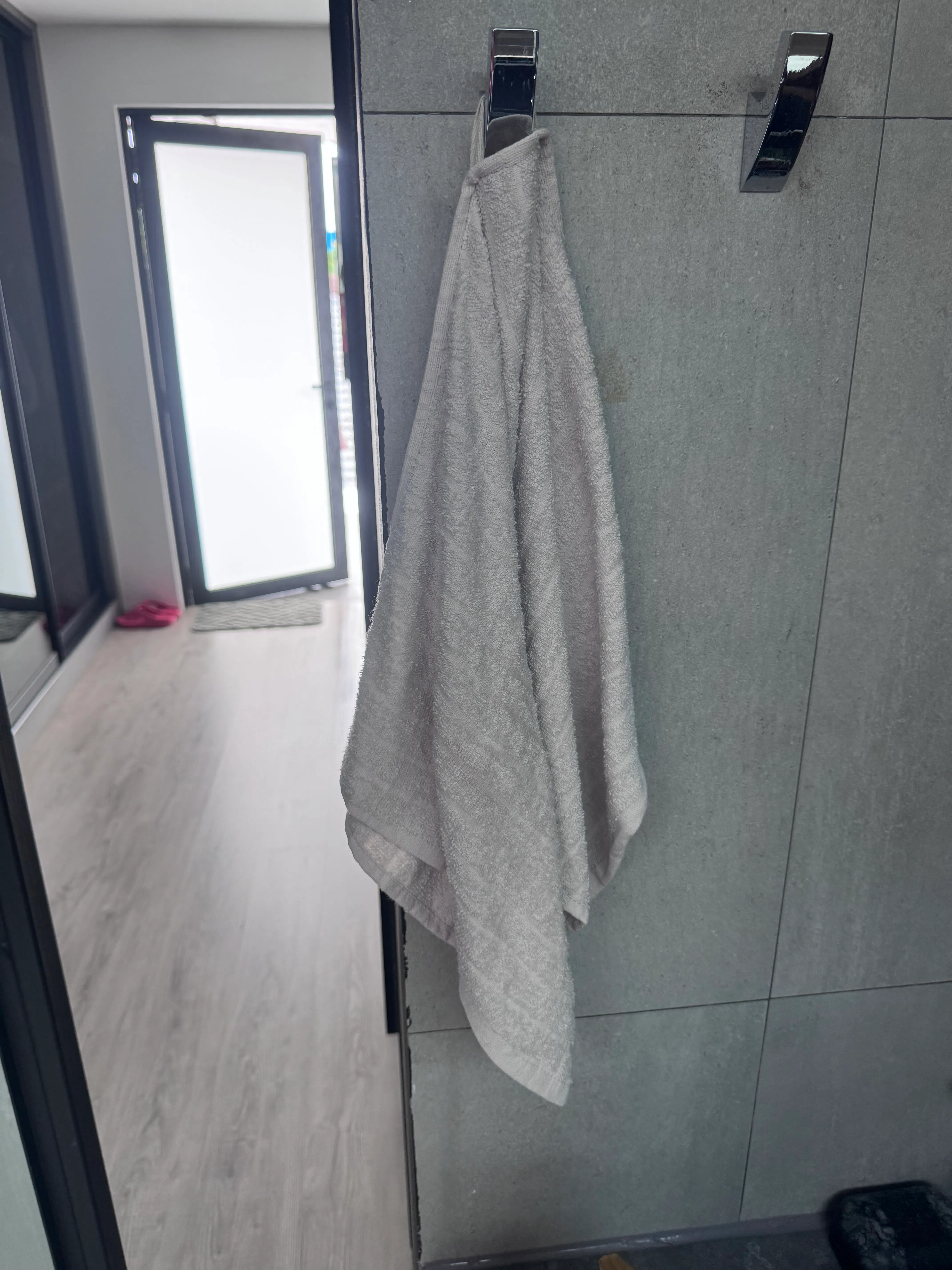 Customer home photo 1: Looks good and feels good. Has a hook as well. Bought at promo price.