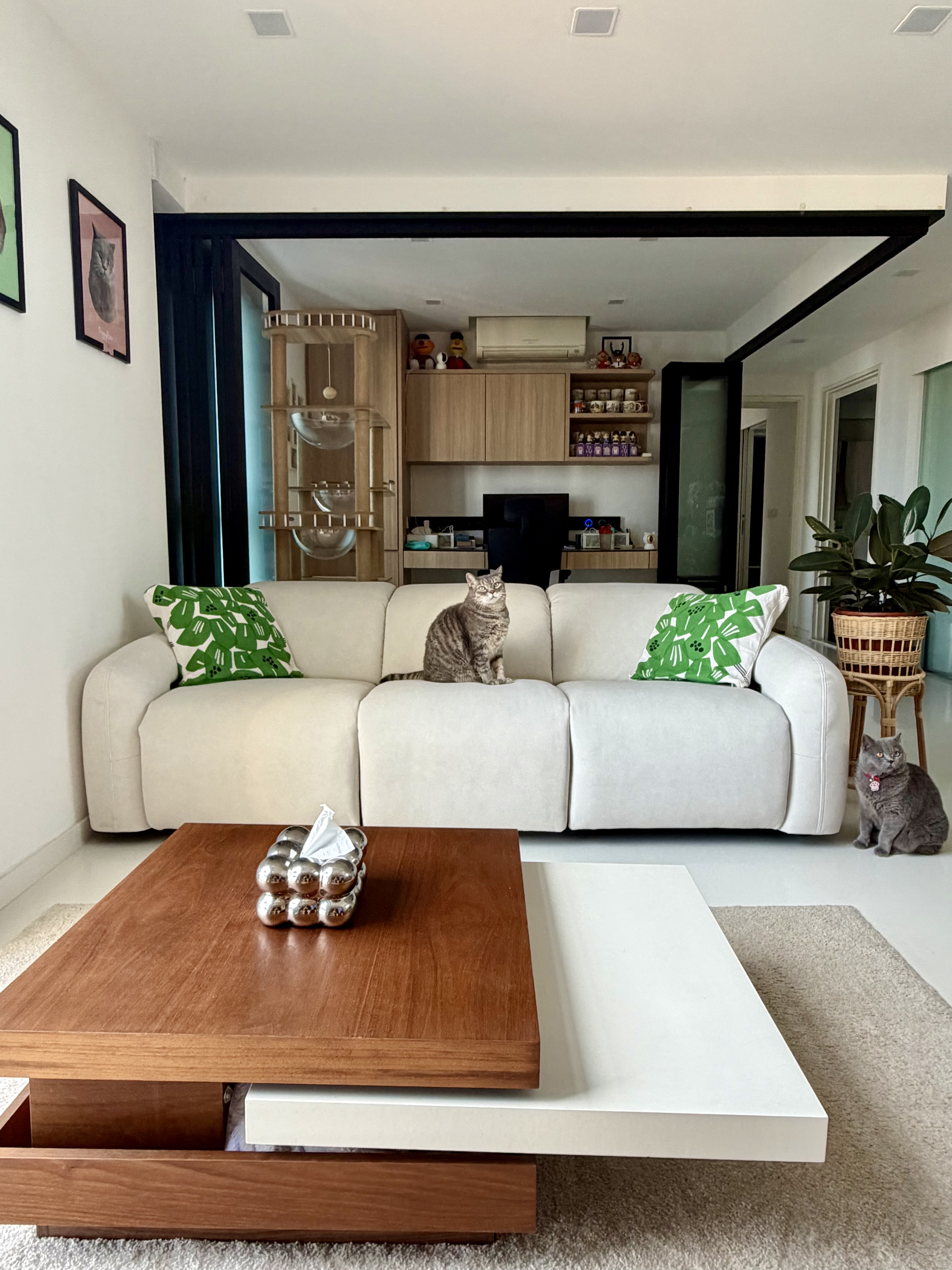 Customer home photo 1: Very sleek minimalist design yet very comfortable. Almost reclining once extended.