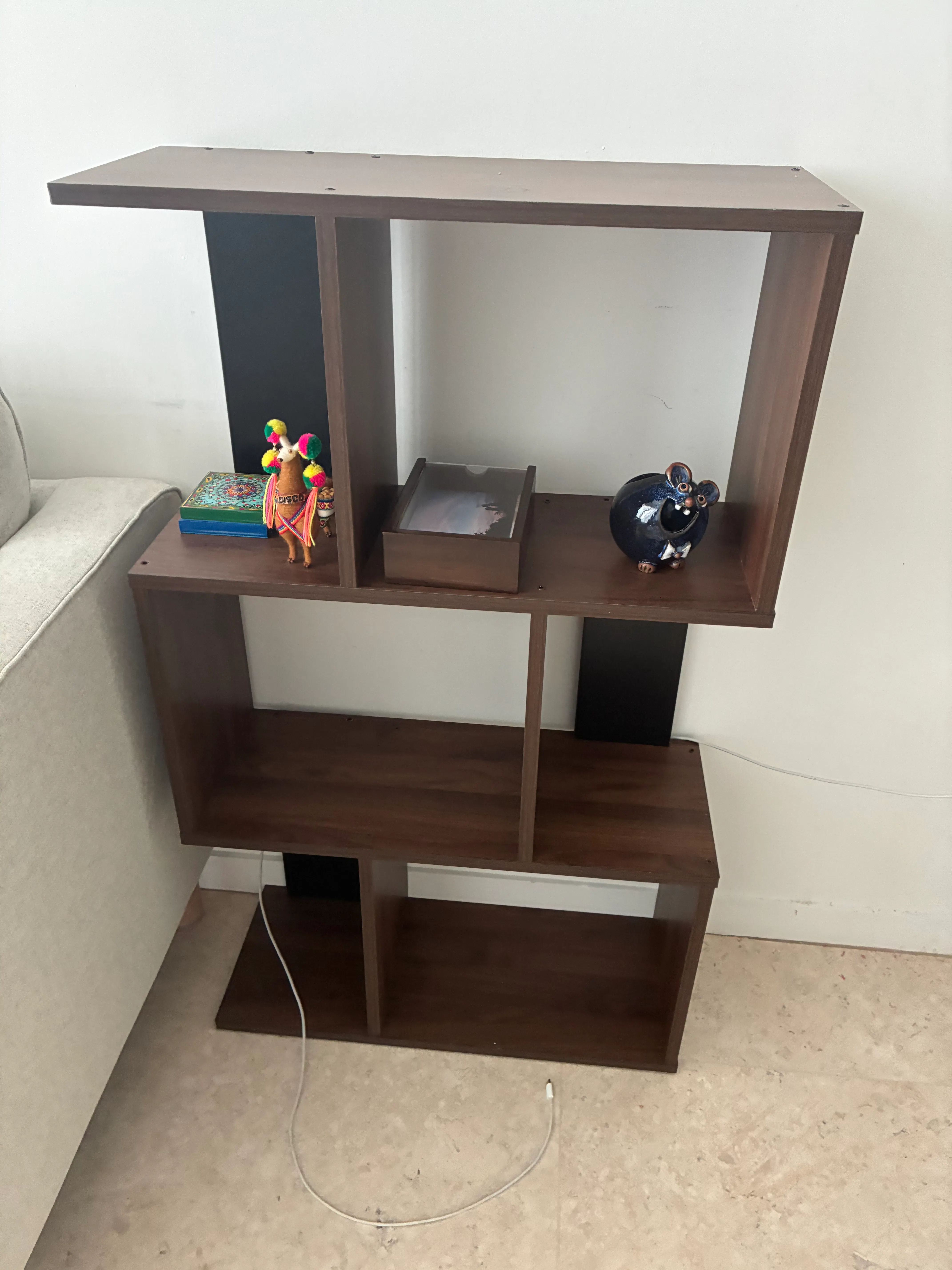 Customer home photo 3: It was delivered in one piece. Looks great and I like the dark wood color.