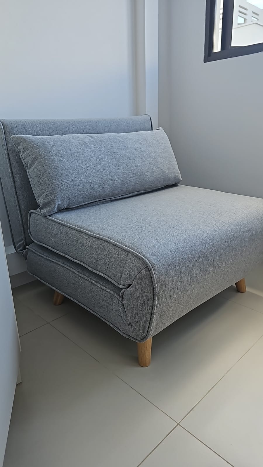 Customer home photo 5: Seat is comfortable and easily opens up into a bed. Not too bulky. Easy to move around if needed.