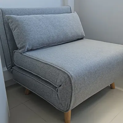 Customer home photo 5: Seat is comfortable and easily opens up into a bed. Not too bulky. Easy to move around if needed.