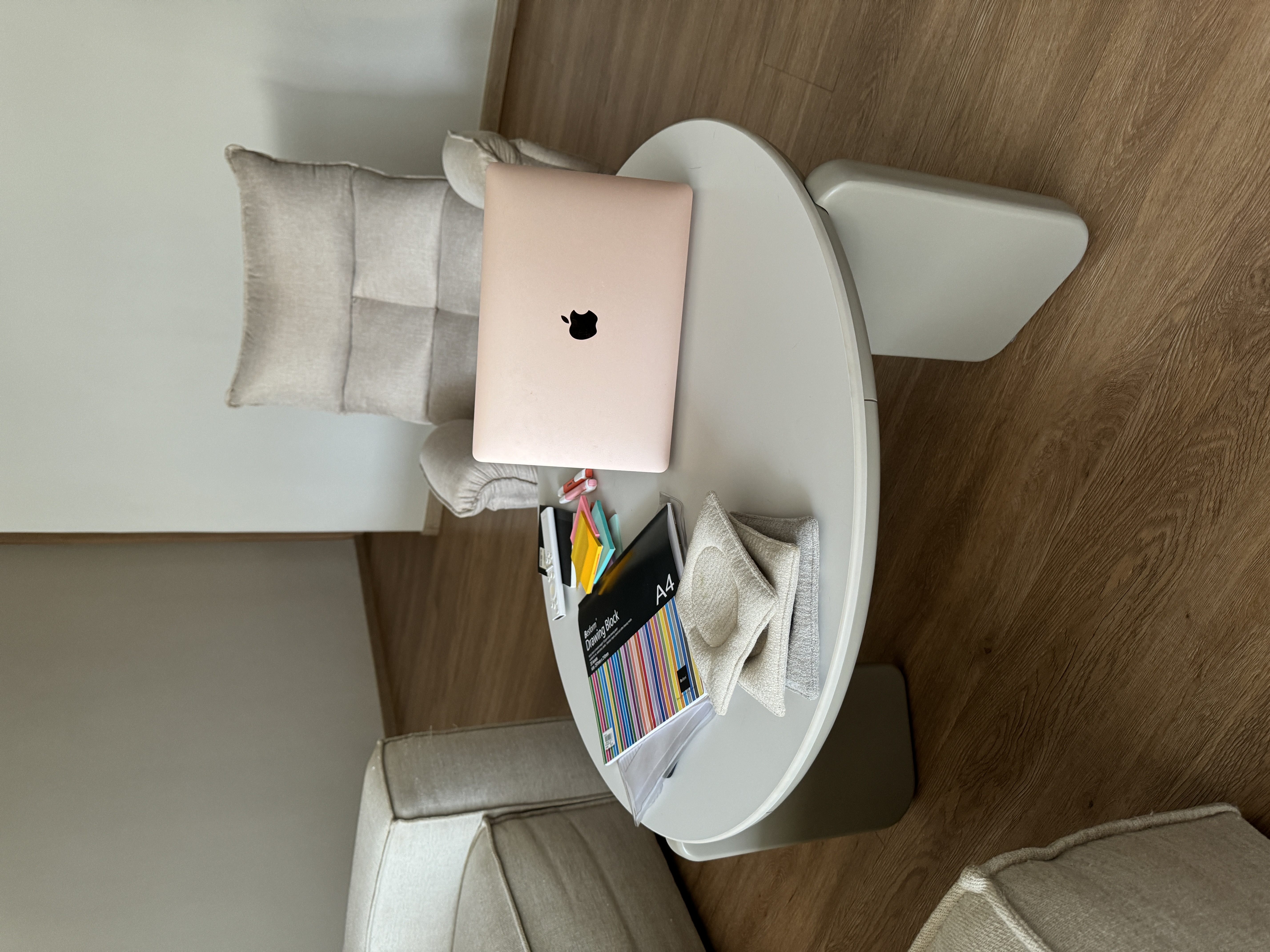 Customer home photo 9: The Blair Round Coffee Table in Grey, Sintered Stone is a great addition to my living room. The sintered stone top has a sleek, modern look, and the neutral color matches well with my decor. This table is solid and durable, resisting scratches and stains with ease.