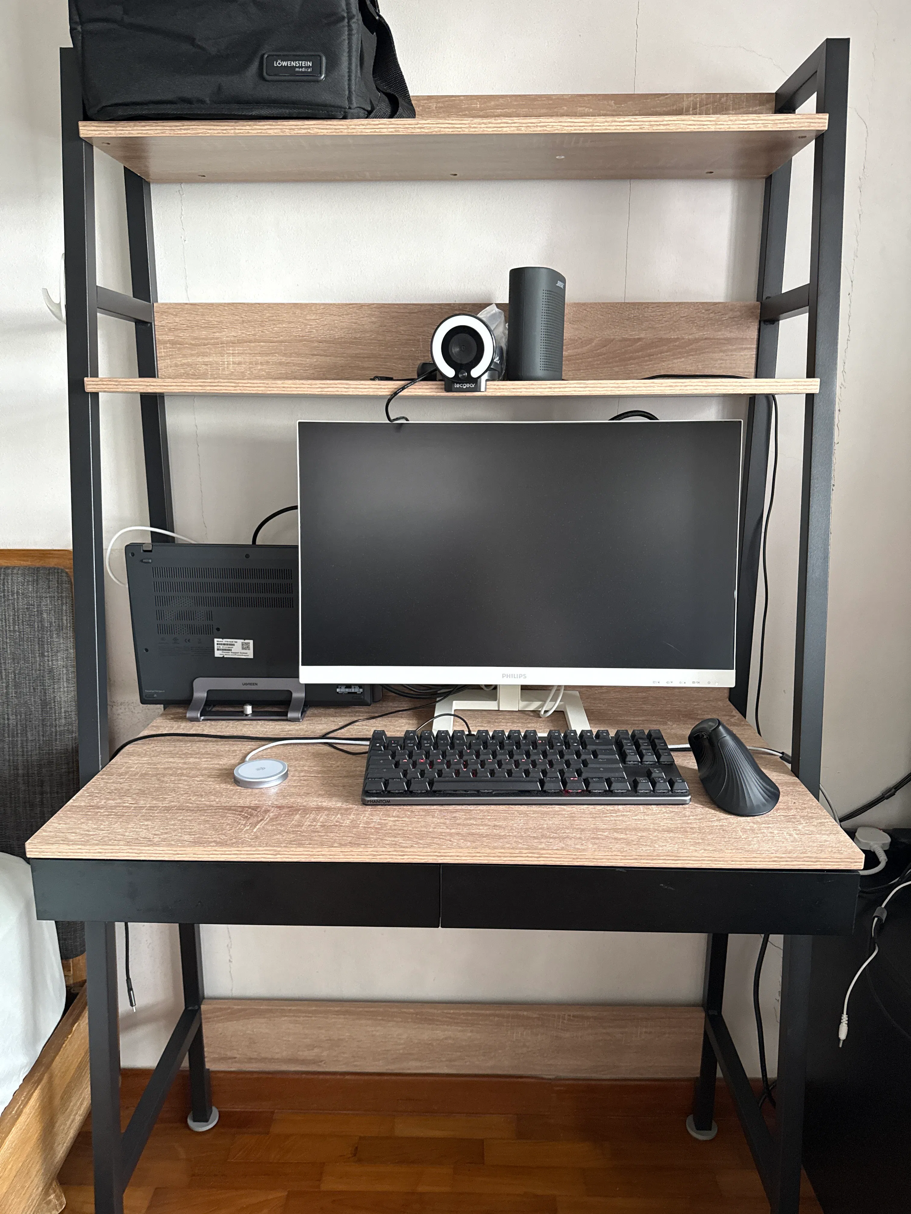 Customer home photo 1: Solid table. Sufficient to put a 24in monitor. Table is stable.