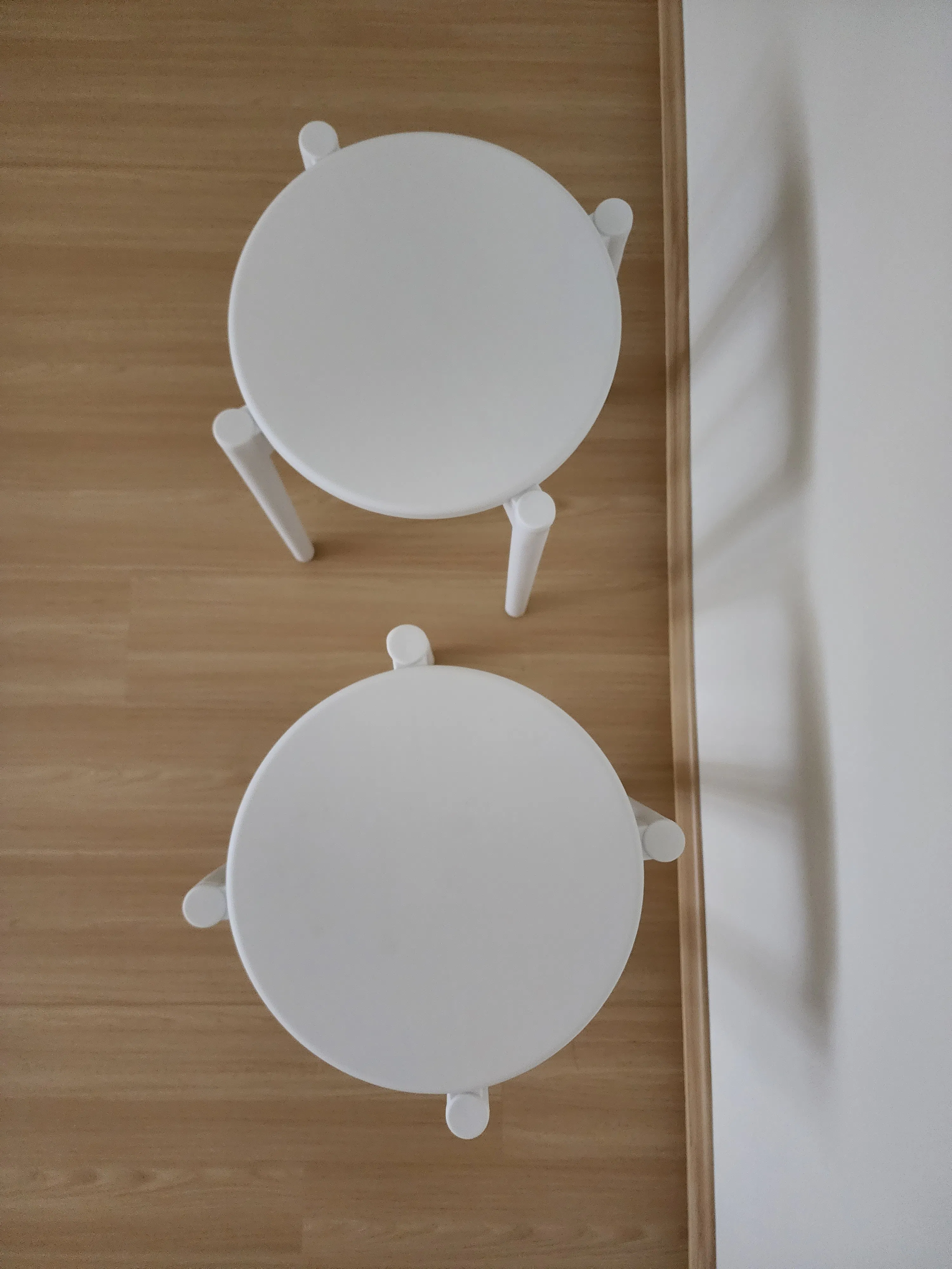 Customer home photo 4: Love the minimalistic design and color. A simple, durable and stackable stool. You can even spice it up with some nice fur/pattern cushions.
