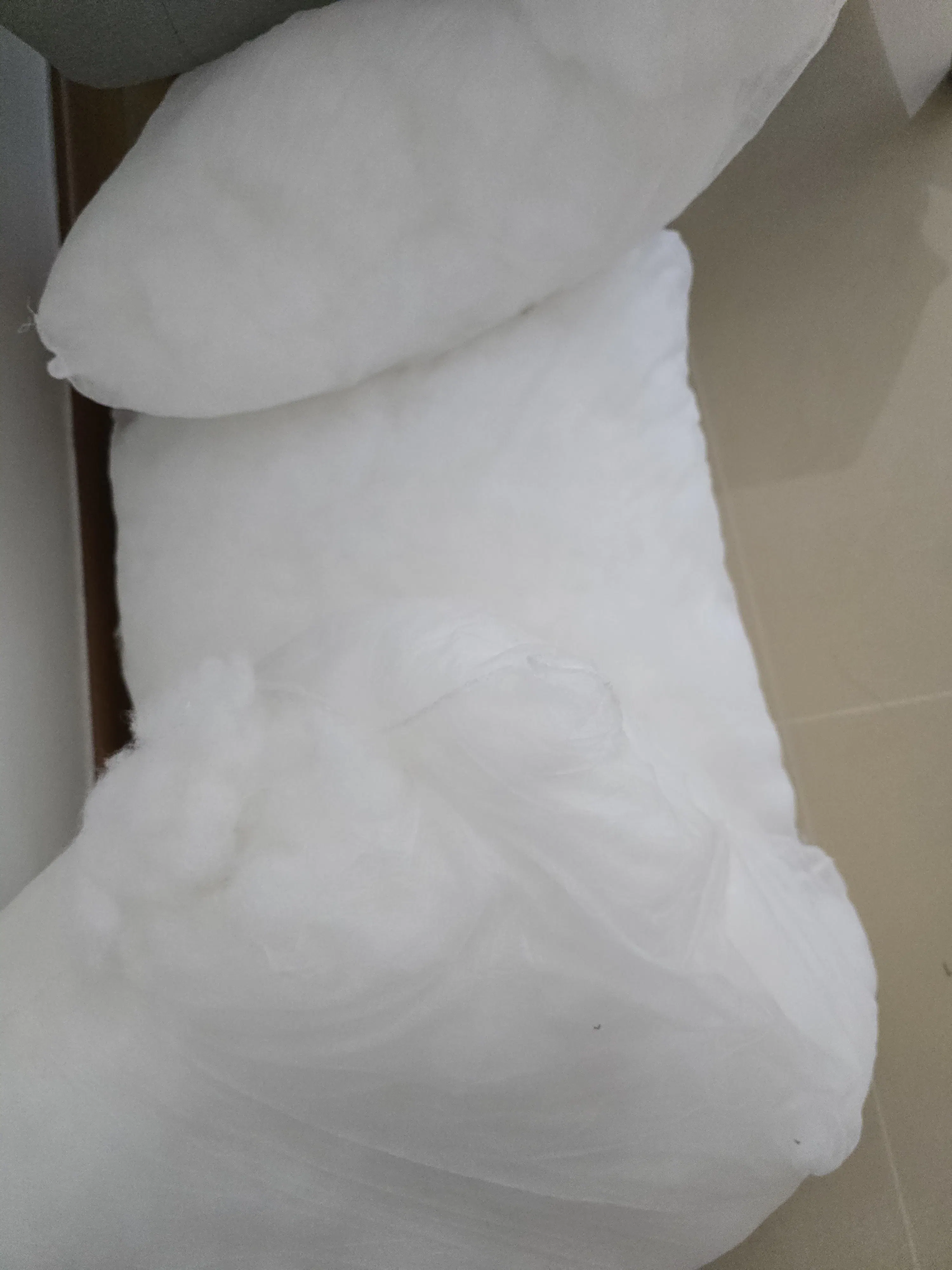 Customer home photo 1: Like the sofa's colour and structure. Sofa quality looks and feels good. Will see whether it's lasting. But the cushions material is so flimsy and 2 torn easily when I took out the cushions covers. All the cotton came out instantly.