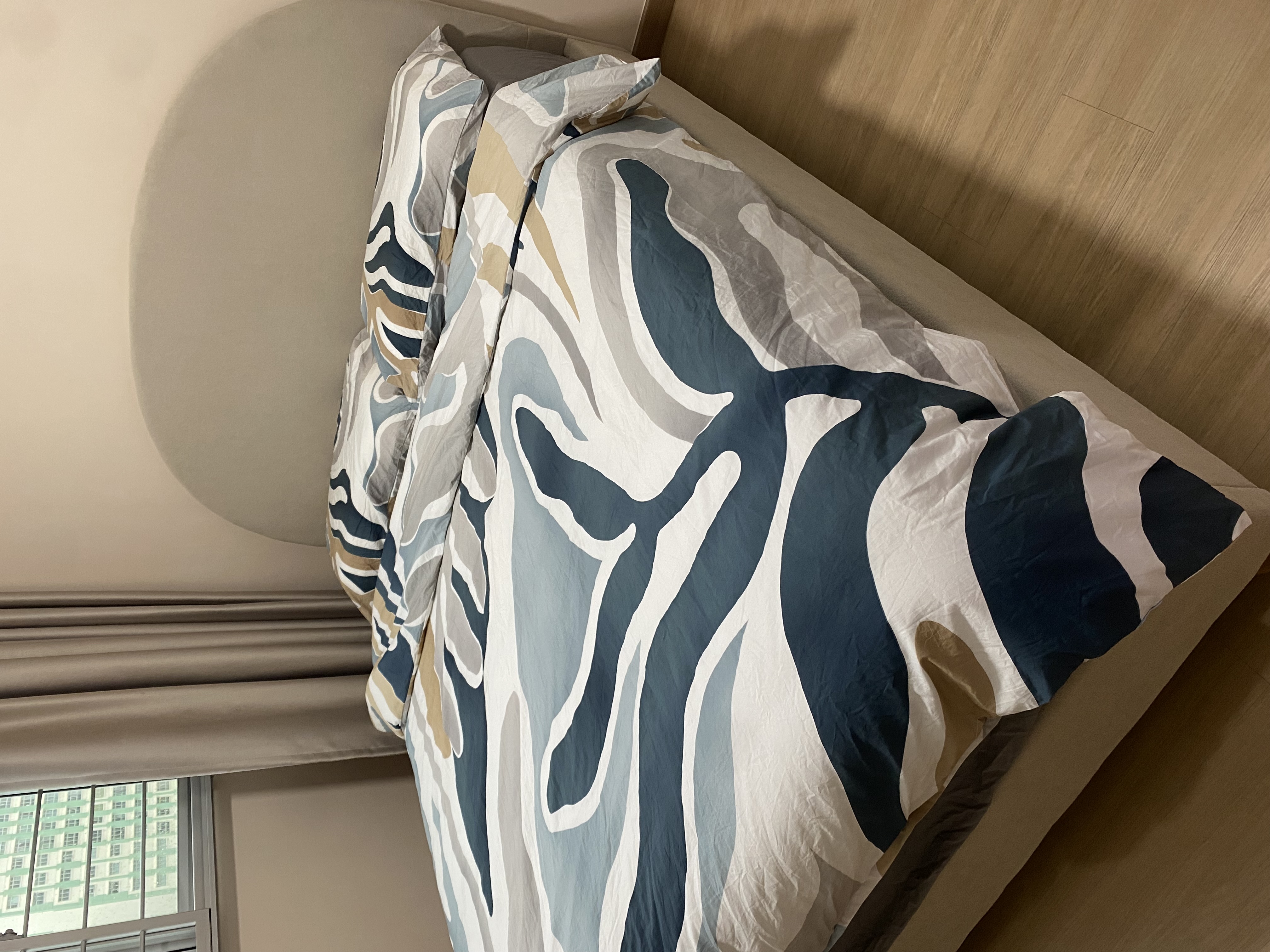 Customer home photo 1: Love the bedframe. It is light, easy to push yet sturdy. The colour complements my room well. Overall, satusfied with my purchase.