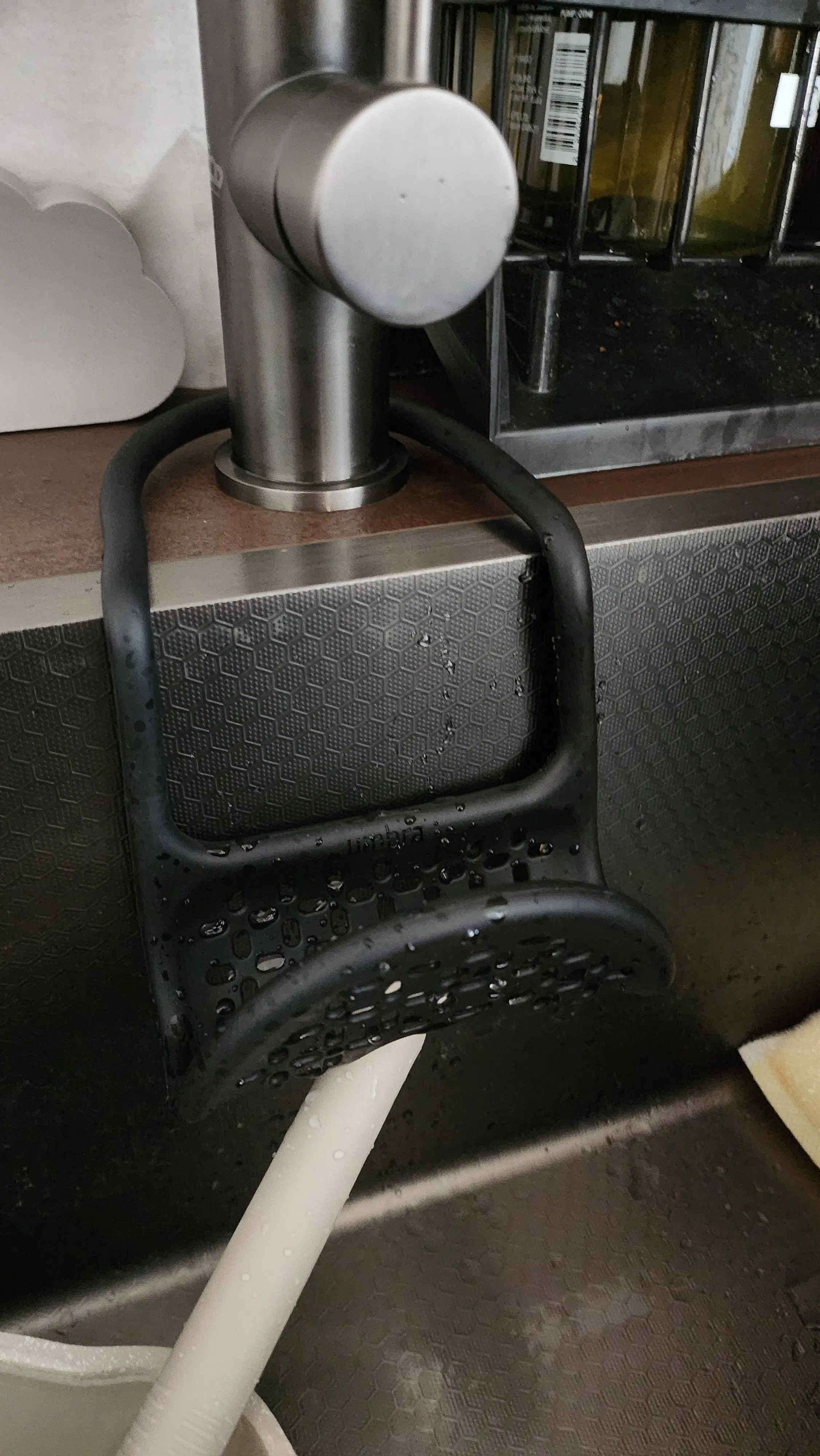 Customer home photo 3: Been trying to find this and glad I came across it at hipvan for a cheaper price. Its bendable so you can shape it however you want but this can only fit 1 standard size sponge at the most. Tried bending it to hold 2 sponges but it keeps falling. There's not enough surface.