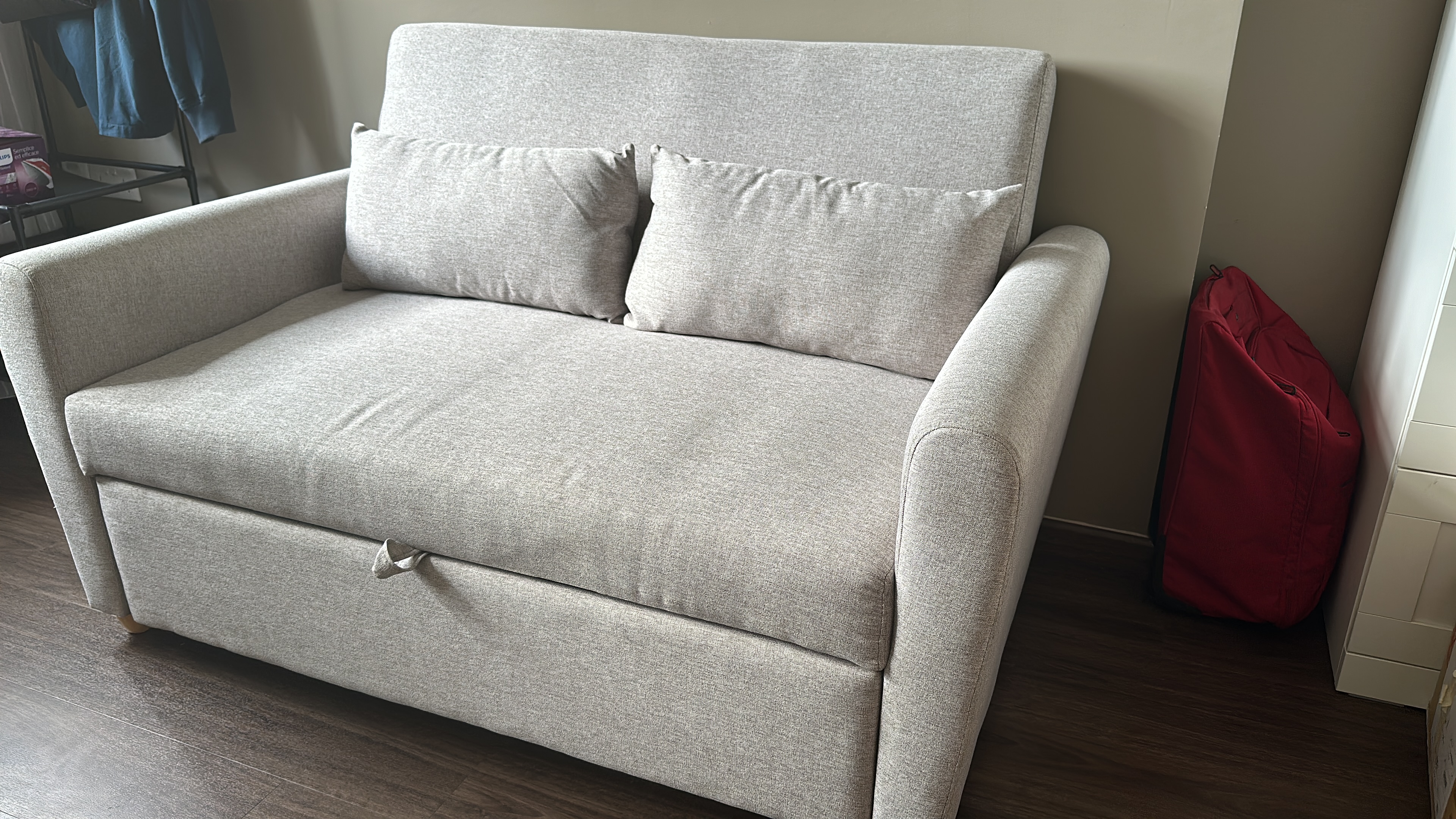 Customer home photo 18: Easy pull out to become a bed and reassembly. Comfortable seat and nice fit for a BTO bedroom