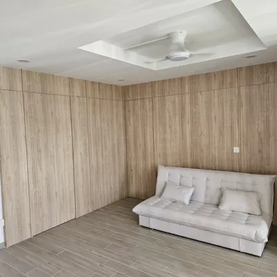Customer home photo 12: The sofa feels so cosy in my living room corner. The firmness is just right and the stain proof fabric is a game changer