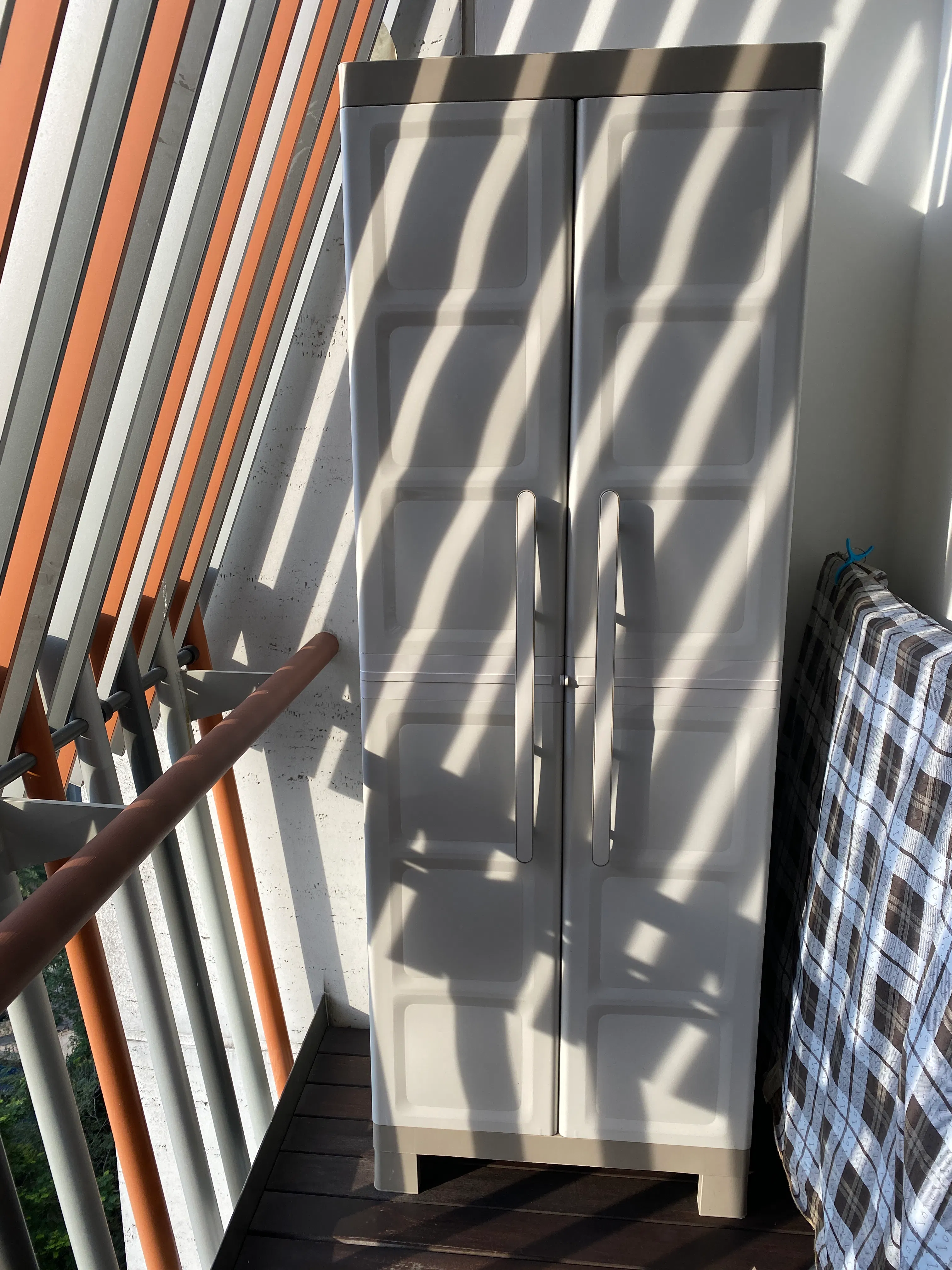 Customer home photo 1: A nice compact utility cabinet that fits nicely on my back balcony.