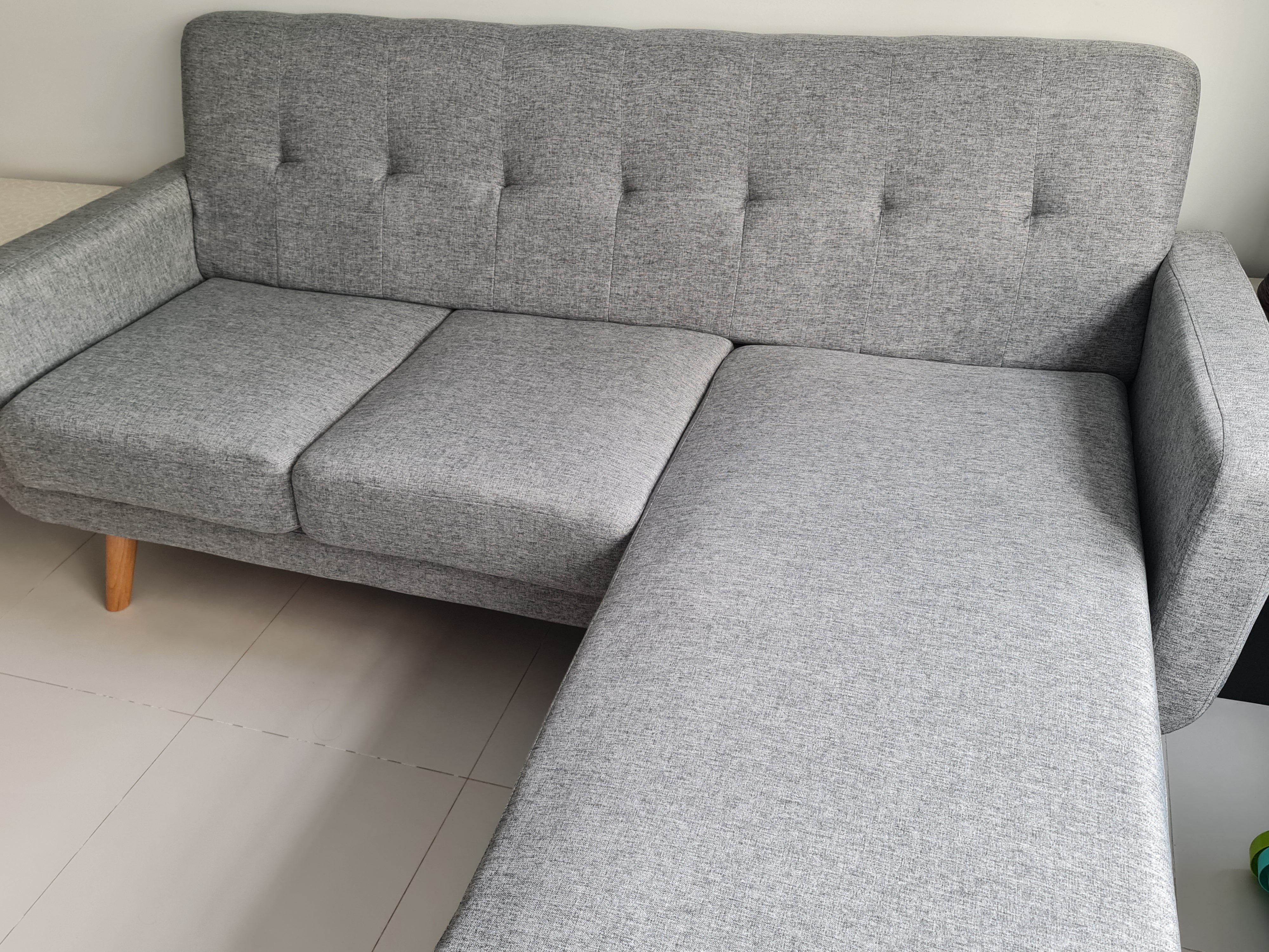 Customer home photo 14: Sufficient details of products are given on Hipvan website and we managed to choose the most suitable sofa just before 2023. Received it in good condition on our requested date. Thanks the delivery guys to dispose of our old sofa and also fix up this new one. 

The seat cushion is really on the hard side which is what I wanted. Design is modern and clean.