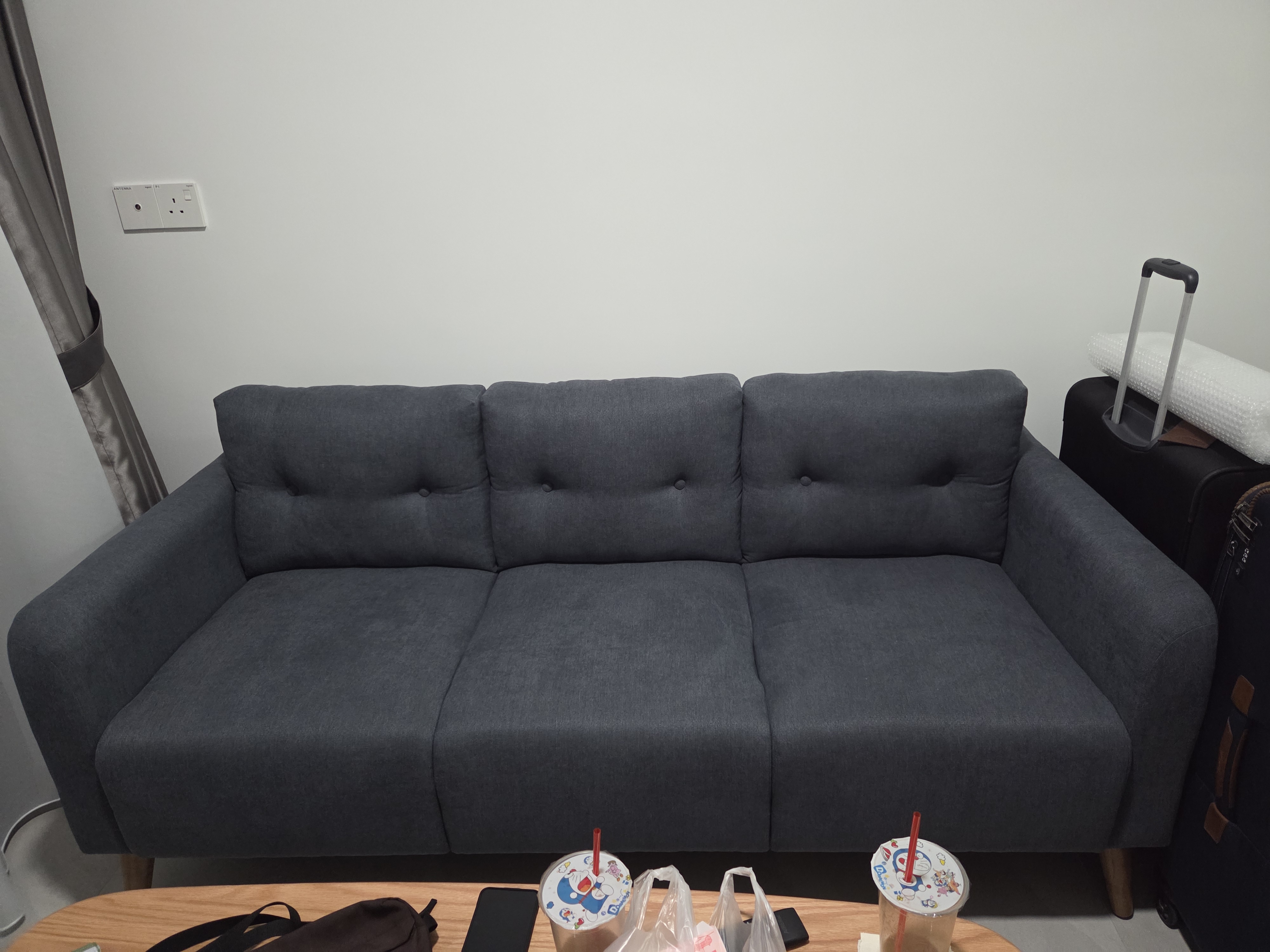 Customer home photo 1: Really happy with my purchase! The firmness is just right and as a petite person, this is comfy to lounge in. My legs are not hanging so much. Lol The color is just nice and I think the fabric is easy to clean and maintain.