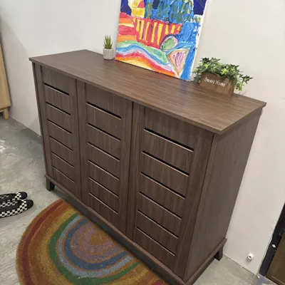 Customer home photo 1: Really tiny planter. You can see it on the left of the painting here. It is cute though.