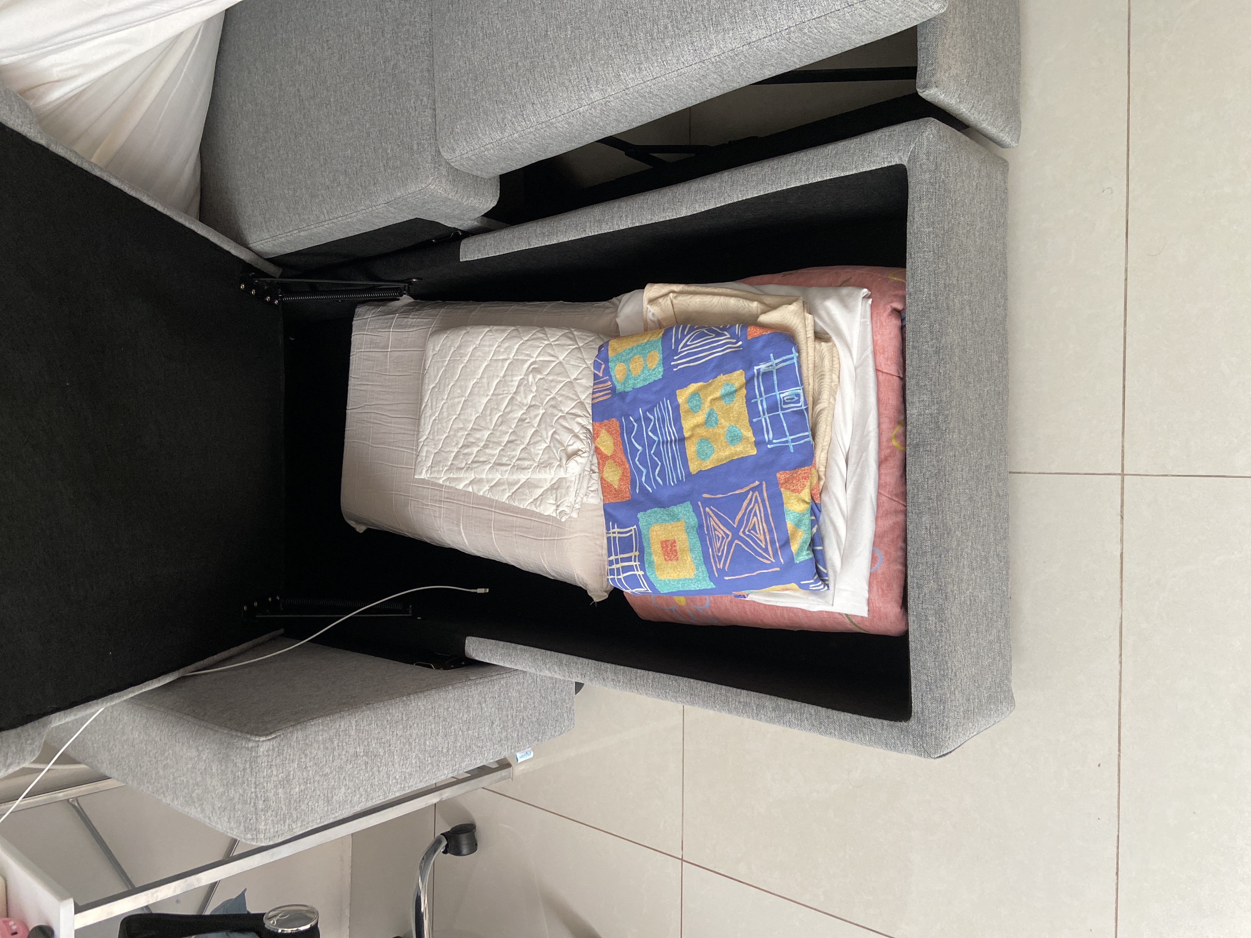 Customer home photo 28: “it’s a great purchase. compact not bulky and comfortable. meant for guest but my daughter has been sleeping on it and she loves it. the storage is quite spacious. I highly recommend. and the delivery guys are very nice, helpful, strong and efficient.