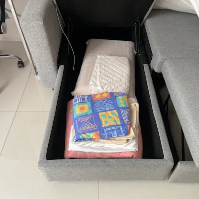 Customer home photo 28: “it’s a great purchase. compact not bulky and comfortable. meant for guest but my daughter has been sleeping on it and she loves it. the storage is quite spacious. I highly recommend. and the delivery guys are very nice, helpful, strong and efficient.