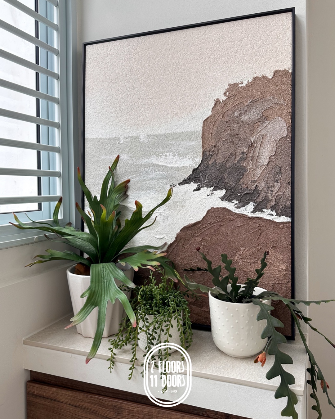 Customer home photo 9: Beautiful piece! The texture is amazing, and the colours are perfect for our space. Wish there was an option for a different coloured frame, but still an awesome buy 👍🏽
