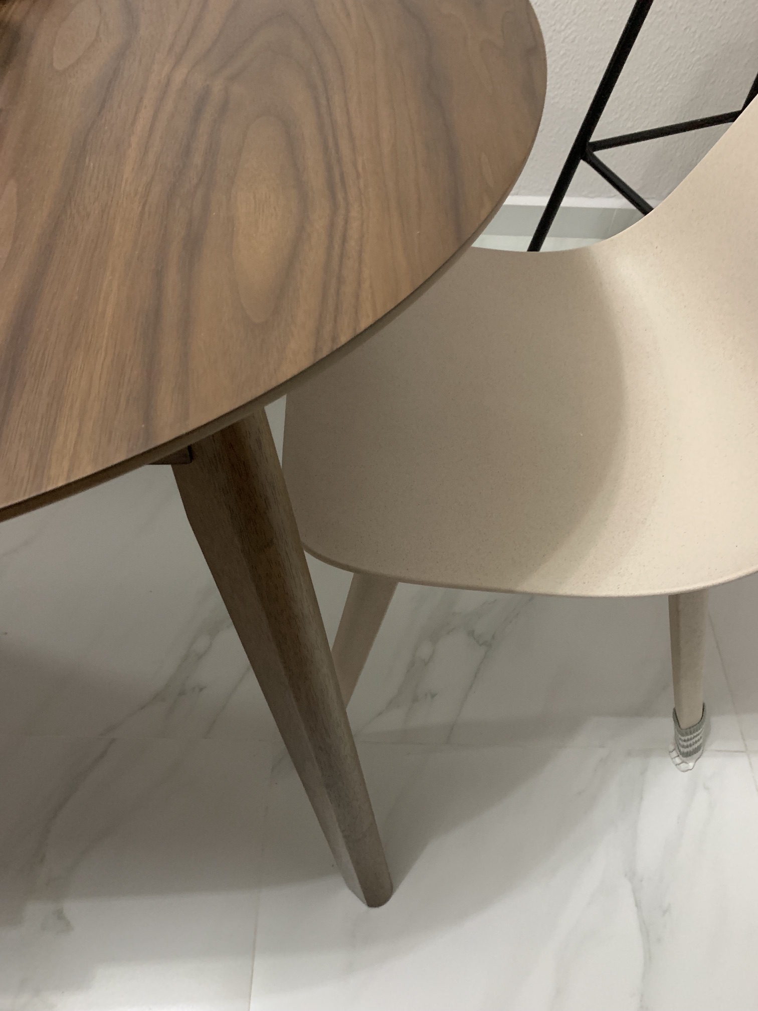 Customer home photo 5: Very lovely table, good smooth edges. On first delivery, 2 legs were not fastened properly resulting in shaky table. Thanks for the fast servicing customer care team, they came right the same day afternoon upon receiving our feedback online. All fixed and tested. We're very happy with the handsome table now. All parts are smooth and rounded, nice feel. Just beware not to drag any sharp/rough edged objects/boxes as it could easily scratch the table top (eg. your cookie tins/ kids' stationery etc).