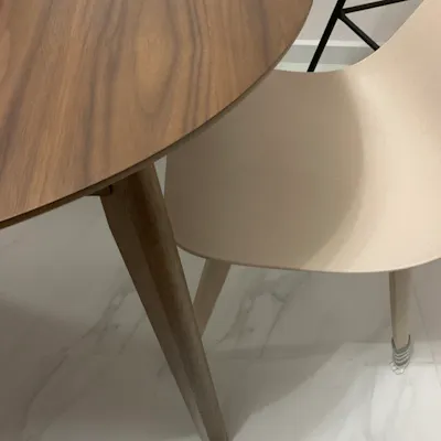 Customer home photo 5: Very lovely table, good smooth edges. On first delivery, 2 legs were not fastened properly resulting in shaky table. Thanks for the fast servicing customer care team, they came right the same day afternoon upon receiving our feedback online. All fixed and tested. We're very happy with the handsome table now. All parts are smooth and rounded, nice feel. Just beware not to drag any sharp/rough edged objects/boxes as it could easily scratch the table top (eg. your cookie tins/ kids' stationery etc).