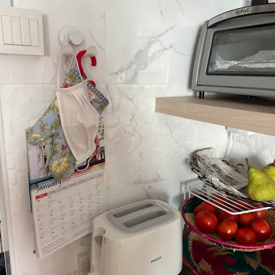 Customer home photo 5: I like this Gel-lock dble hook cos it matches well with my kitchen tiles n also very practical for me to hang my mask once I m back from the market plus gloves for the toaster etc. Thanks Hipvan!