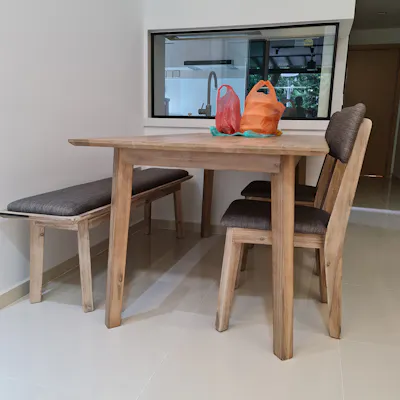 Customer home photo 1: Glad that the chairs are light despite this being solid wood and upholstered.