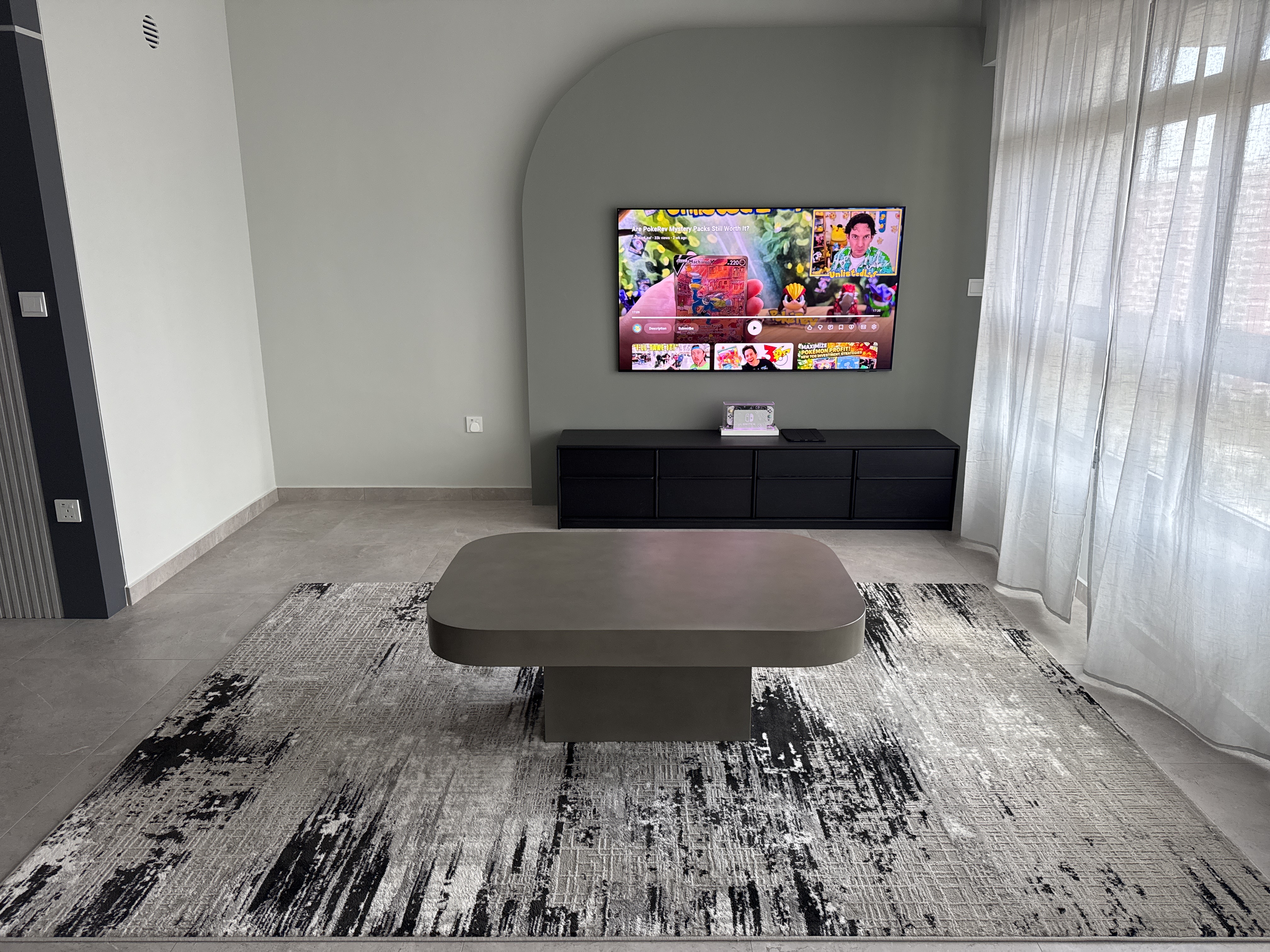Customer home photo 1: Absolutely love this full concrete coffee table. Definitely a statement piece for my living room.