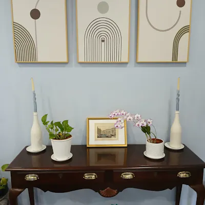 Customer home photo 2: I was delighted to receive my triptych of Art Deco prints., they were every bit as good as I had hoped. They look great on my living room wall.
