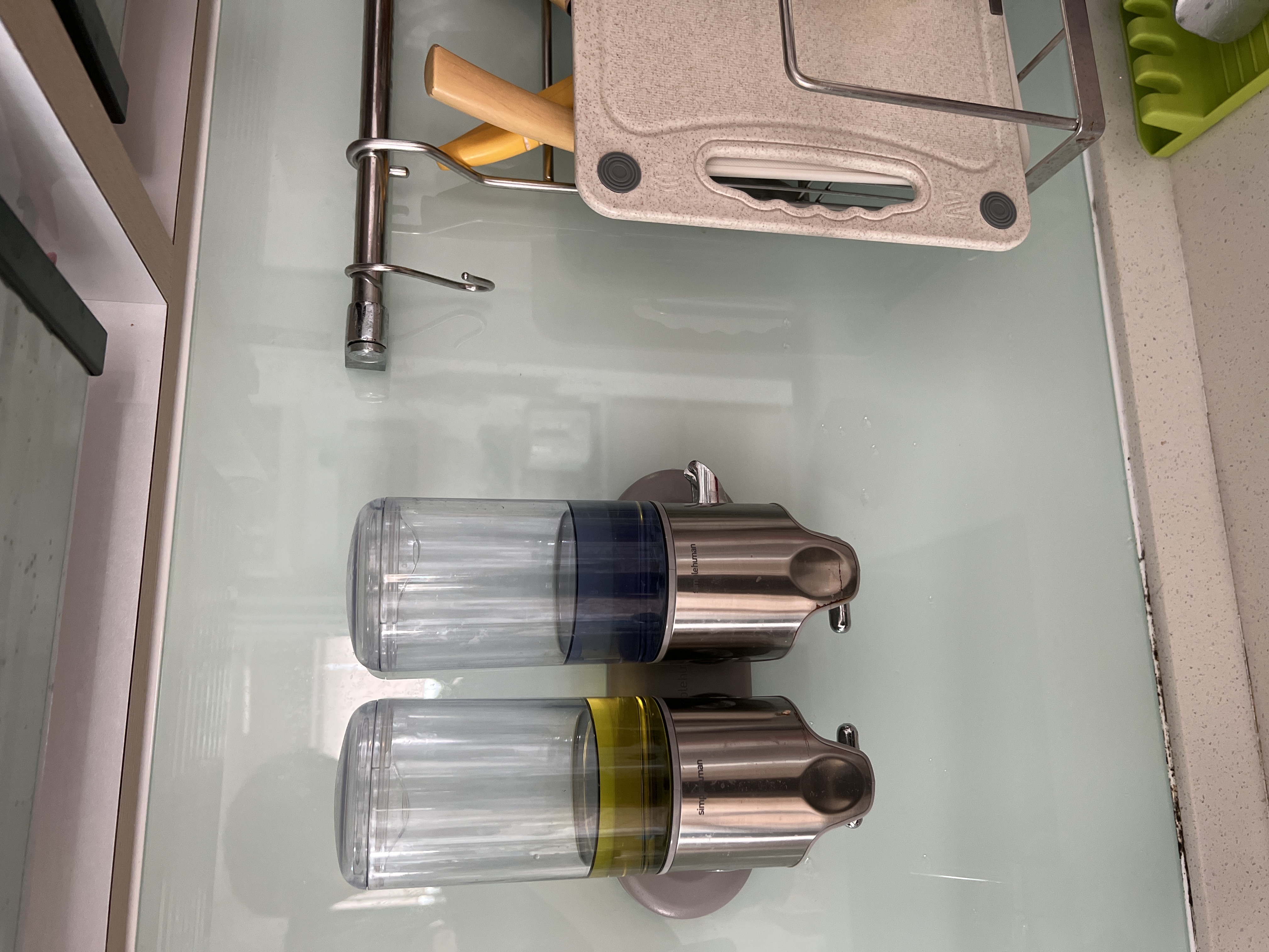 Customer home photo 1: This is the first item I fall in love when I google on Hipvan website ! As I like things tt are transparent - this duo wall mount soap dispenser is a MUST item for my renovated kitchen n I love it!