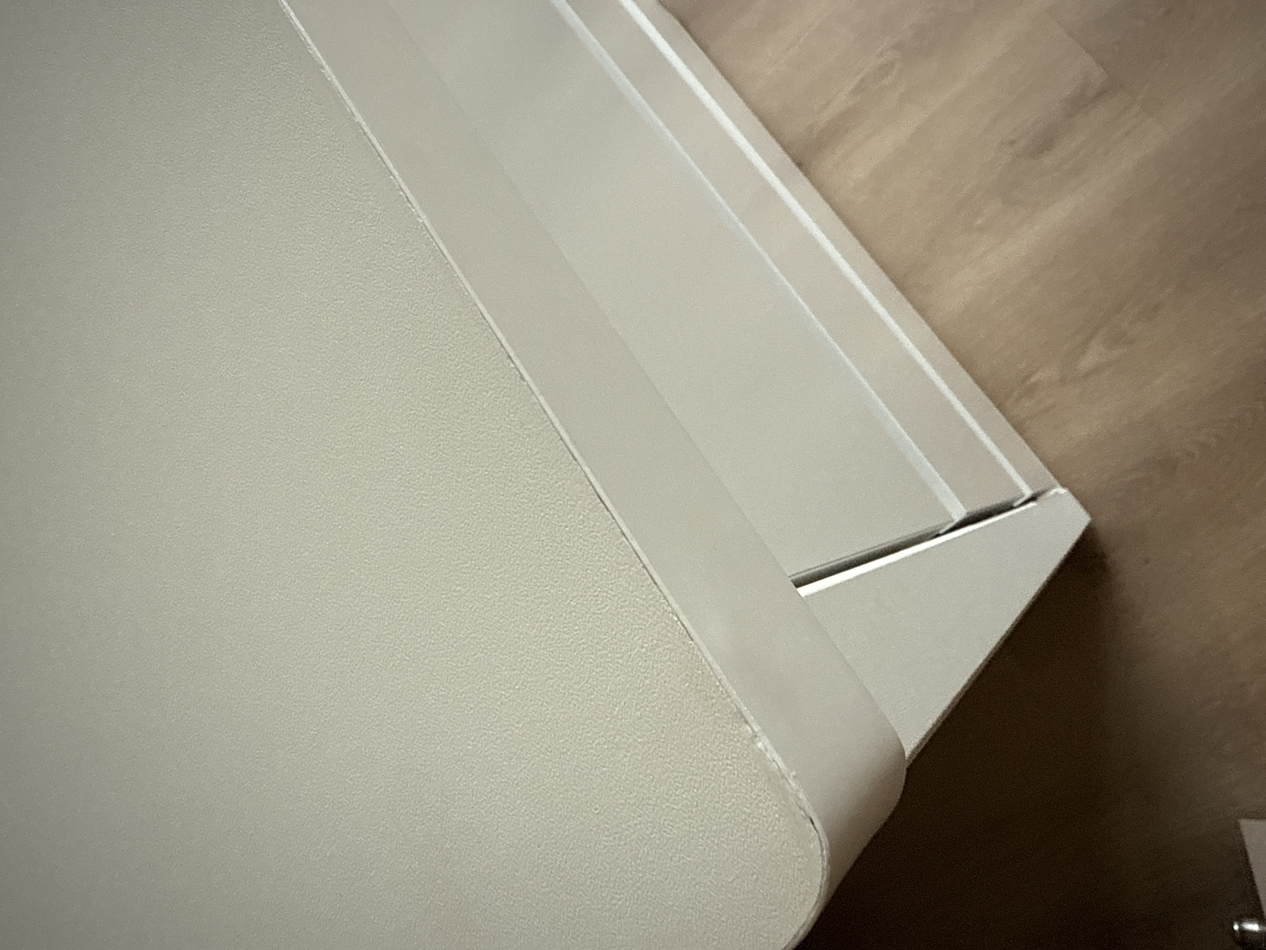 Customer home photo 1: Decent overall and a good size / height for a nursery as I’m planning to use it as a changing table as well. 
Not too pleased with the quality of the corners though as they appear damaged. I brought it up to the delivery man and he says it is just how it is.