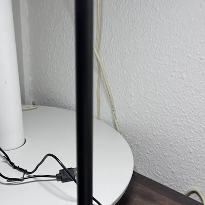Customer home photo 1: A lightweight table lamp offering bright white illumination or a soft yellow dim glow, with light colours that switch effortlessly with a tap on the top.