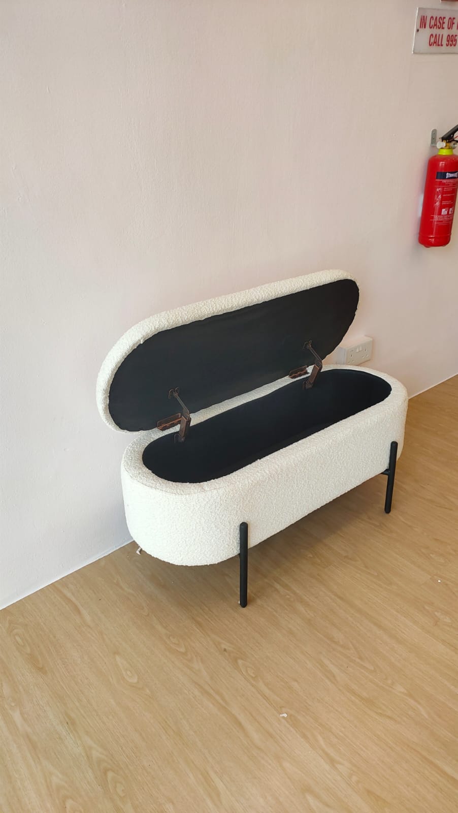 Customer home photo 2: Nice looking. Smells a bit in the storage. Hinge is solid. Seat a bit too low.