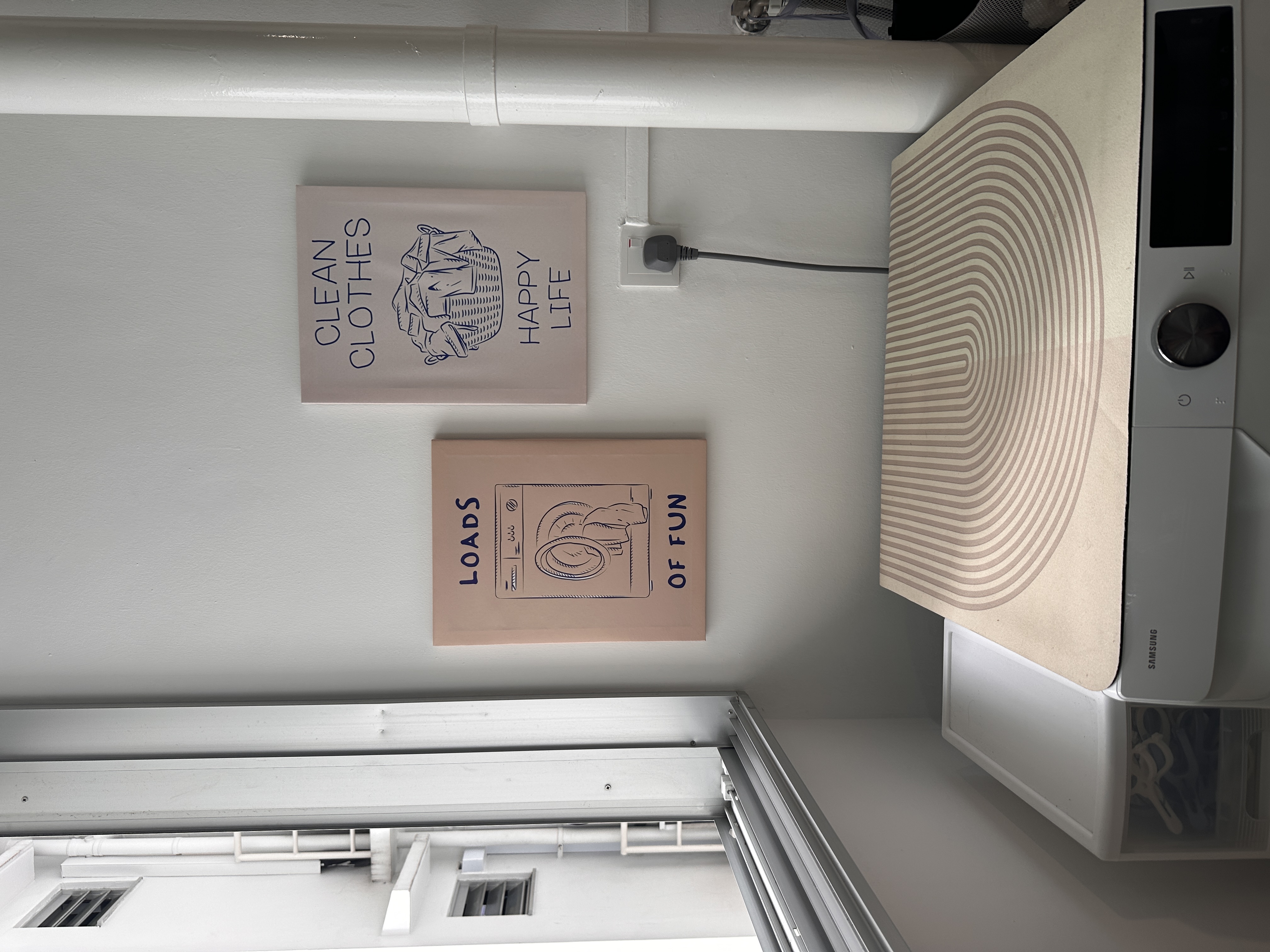 Customer home photo 1: Love this canvas! It’s lightweight and totally love the vibes of my laundry area now.