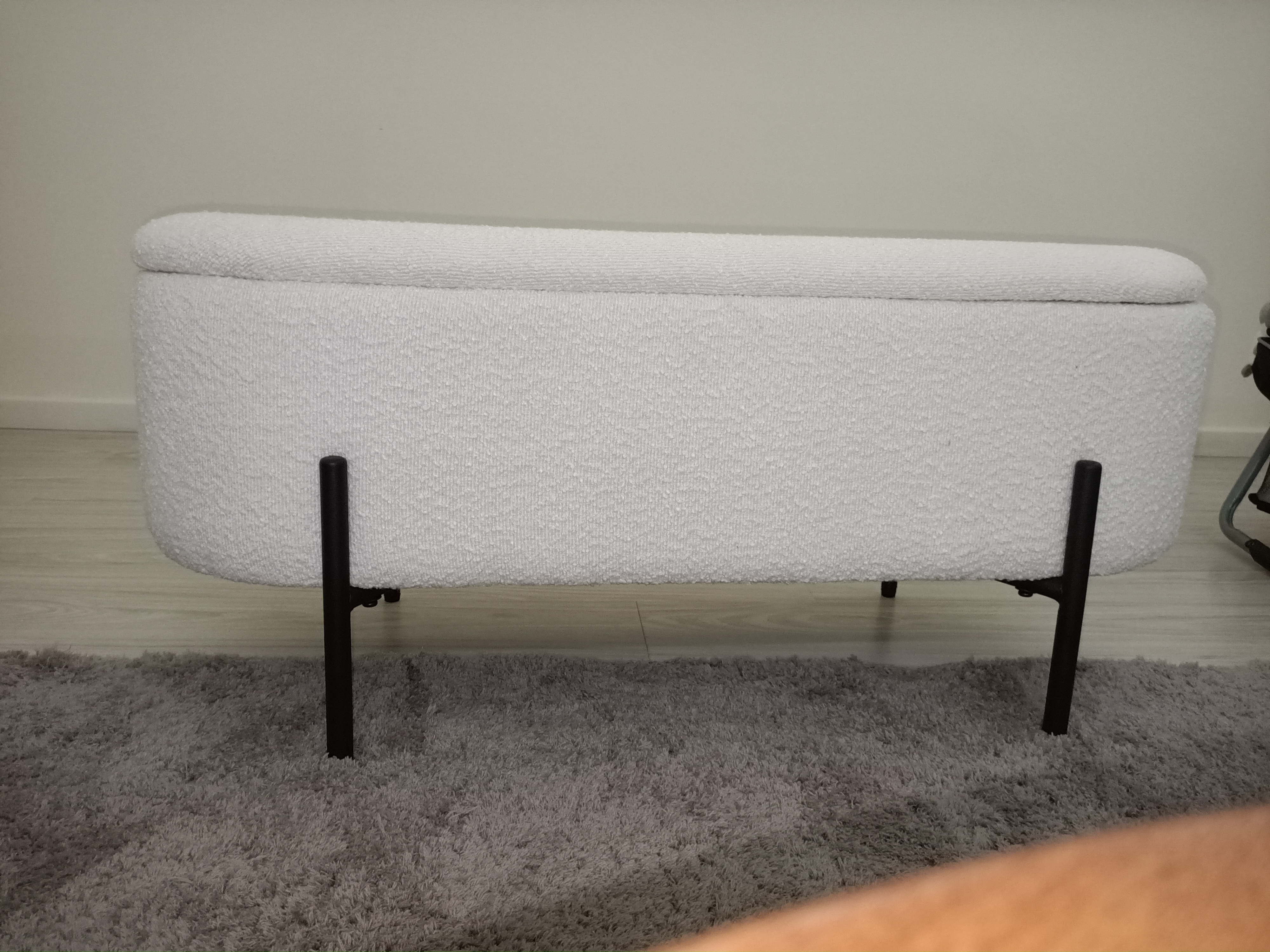 Customer home photo 5: This is icing on the cake for our living room. Completes the clean look we were aiming for. Even can store the cushions in the storage compartment.