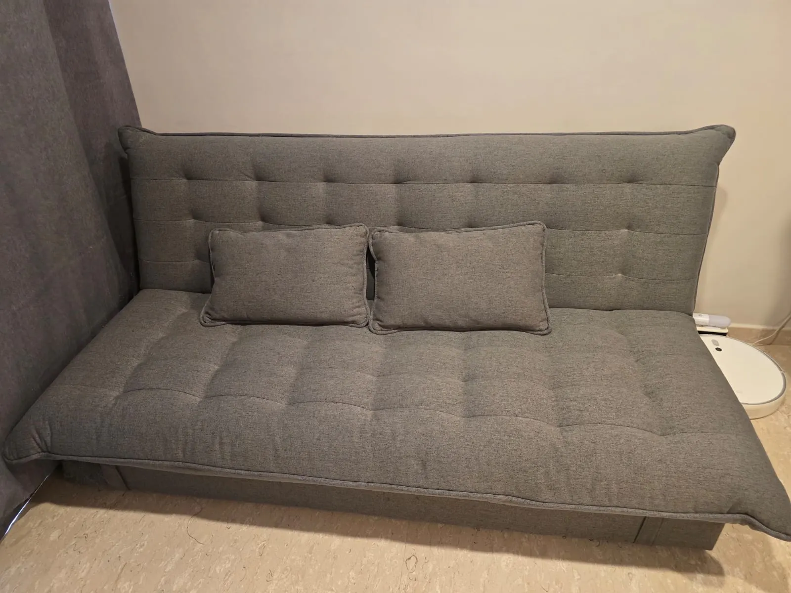 Customer home photo 1: firm cushion and comes with storage space- good!