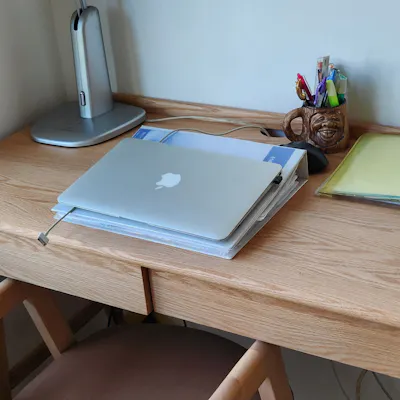 Customer home photo 2: The Japandi look matches the rest of decor very well. Table feels solid enough but the drawers somewhat flimsy.