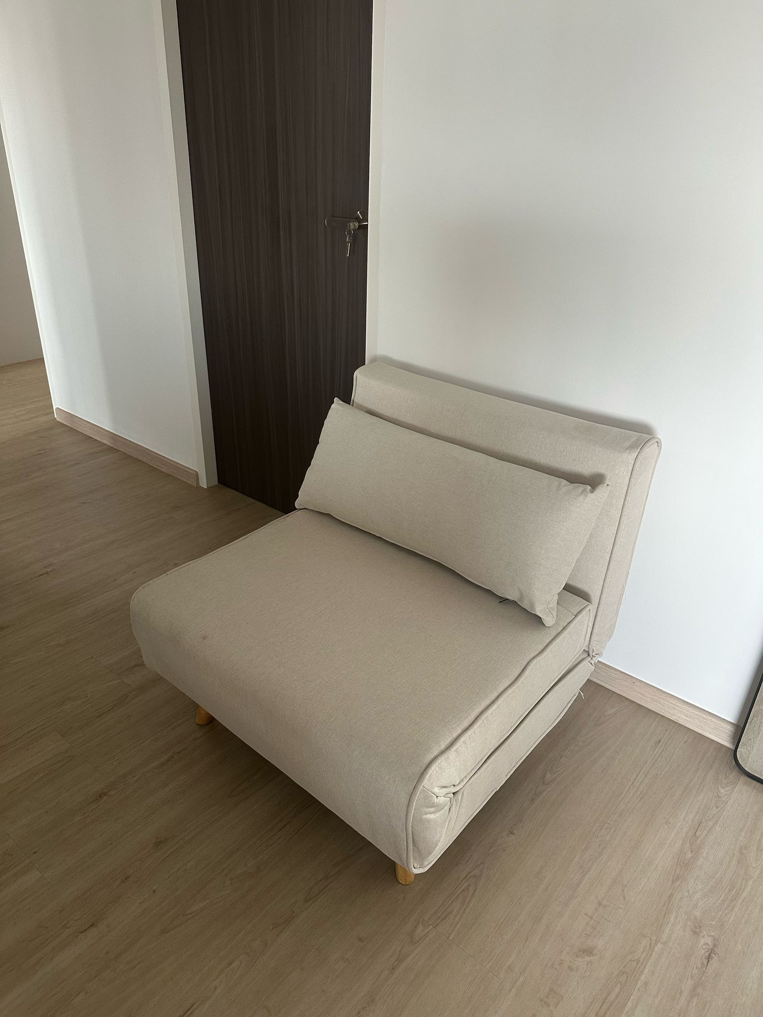 Customer home photo 6: The sofa bed is both stylish and comfortable for sitting or resting. Upon delivery, I noticed some loose threads and a minor stain on the fabric. However, the HipVan team quickly arranged a replacement, ensuring a smooth and pleasant purchase experience still. That said, I was a bit bumped to see the price drop by $20 the next day after I checked out.