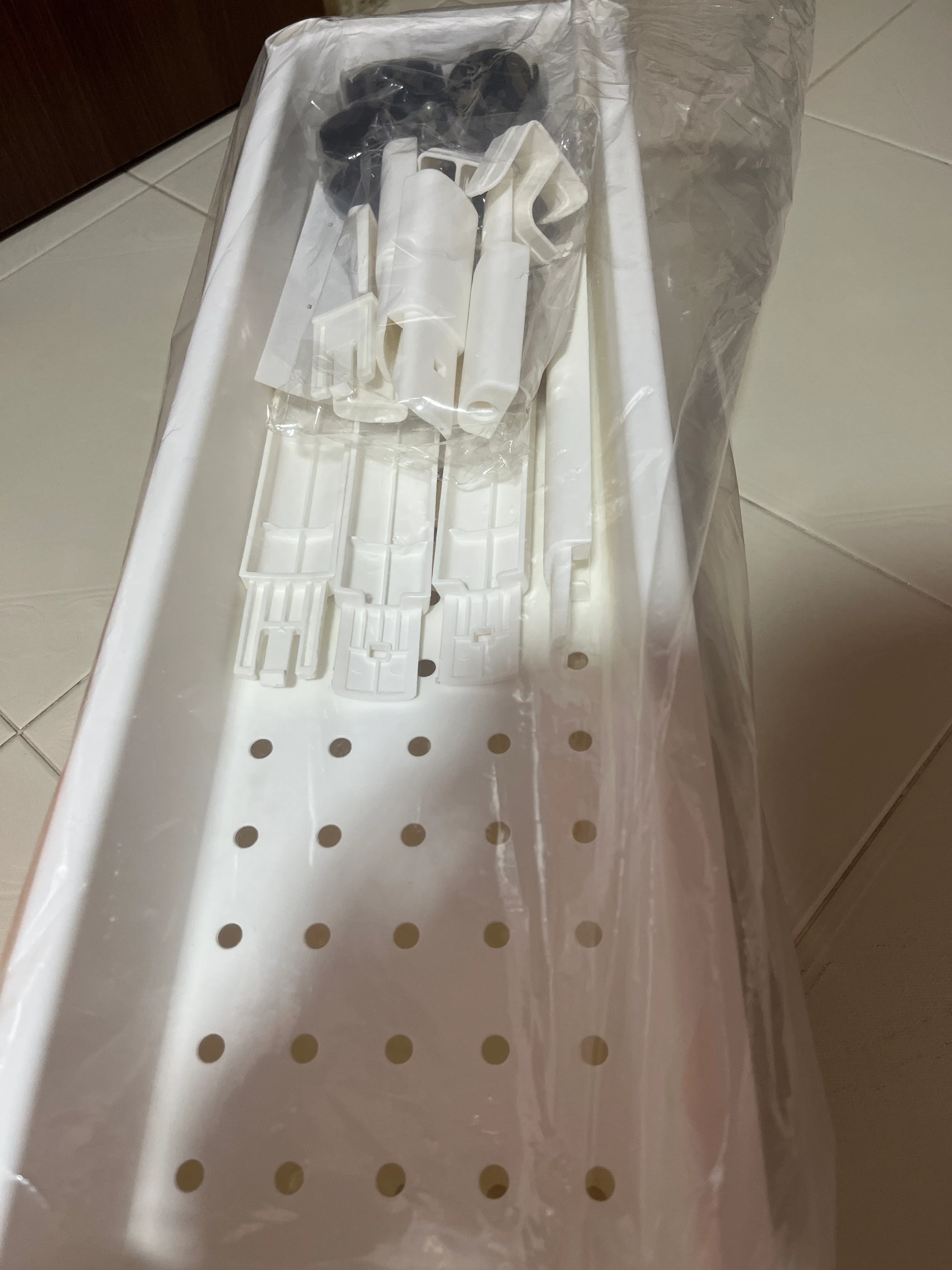 Customer home photo 2: Came well delivered and nicely packed. Bought for a friend to put inside e db door for storing stuff