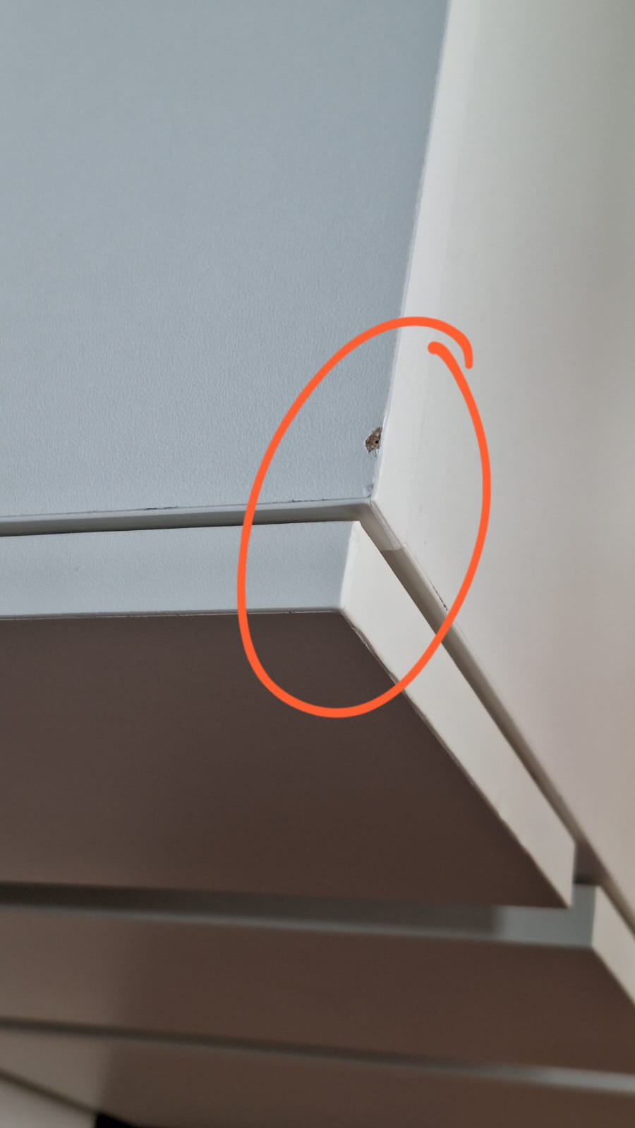 Customer home photo 7: a defect of the bedside table was noted