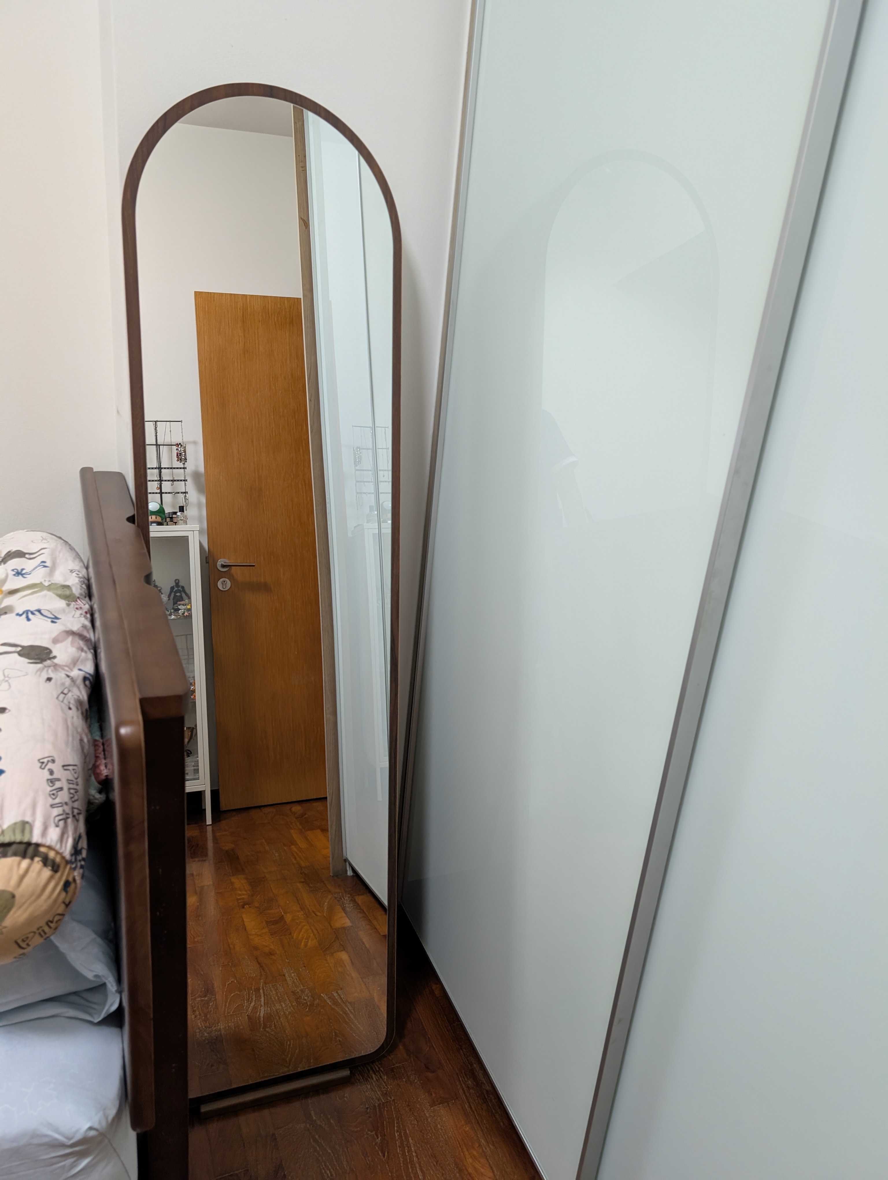 Customer home photo 1: simple elegant standing mirror to match the bedframe colour and easily relocate to any part of the house as needed. nice purchase. hipvan delivers.