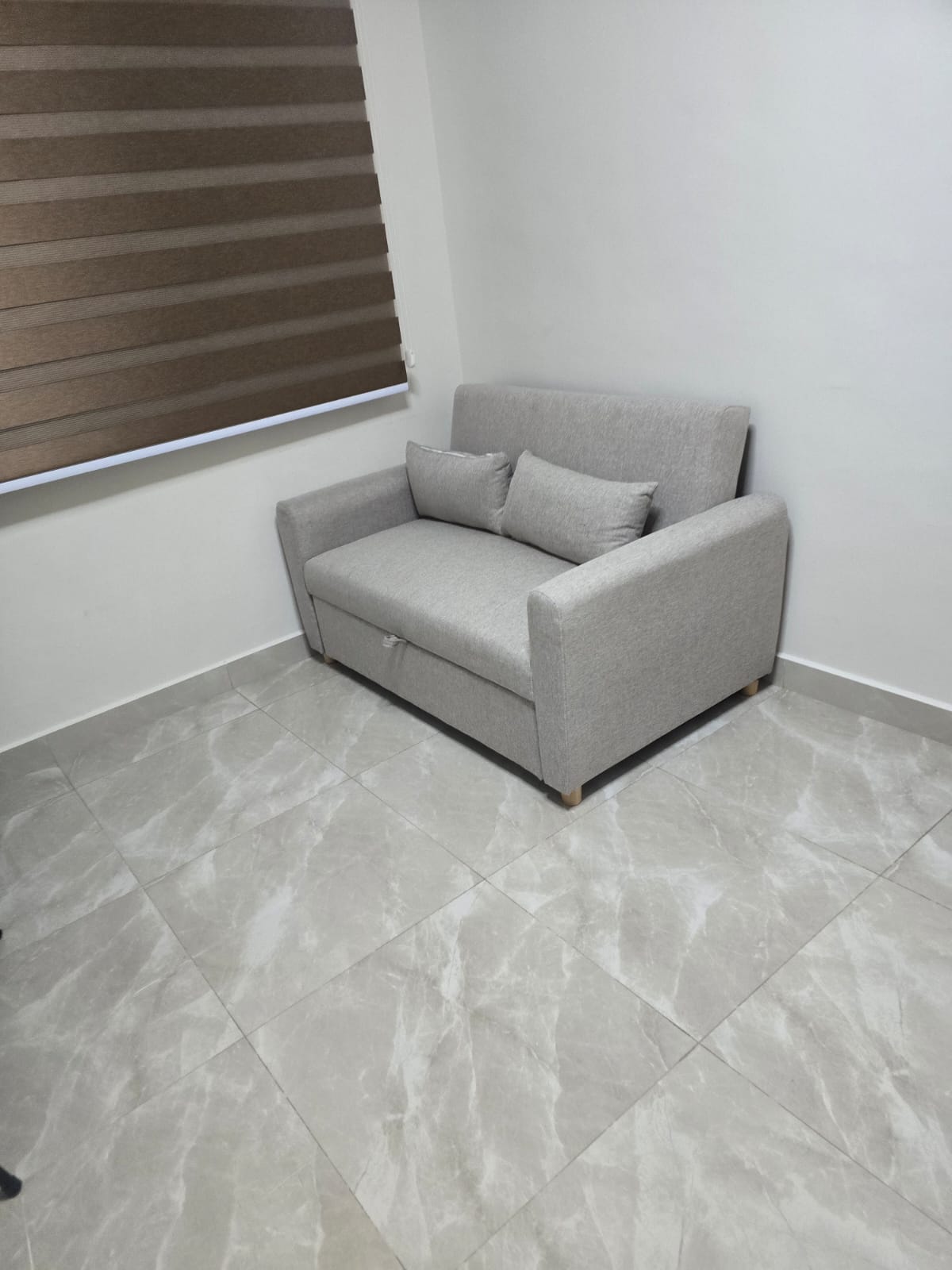 Customer home photo 8: This sofa bed is worth it and it's for my spare room when friends or relatives come over for a gathering I used this and it looks great due to my flooring and matches with it