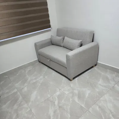 Customer home photo 8: This sofa bed is worth it and it's for my spare room when friends or relatives come over for a gathering I used this and it looks great due to my flooring and matches with it