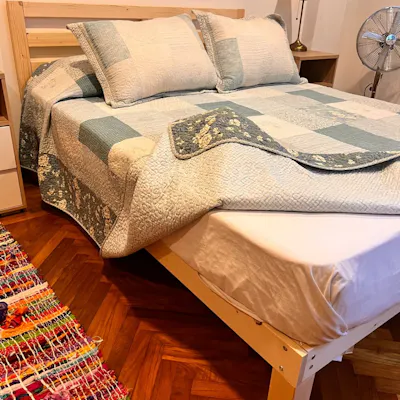 Customer home photo 11: Love the bed because of the color and size, fits perfectly in our room. Is simple but chic.