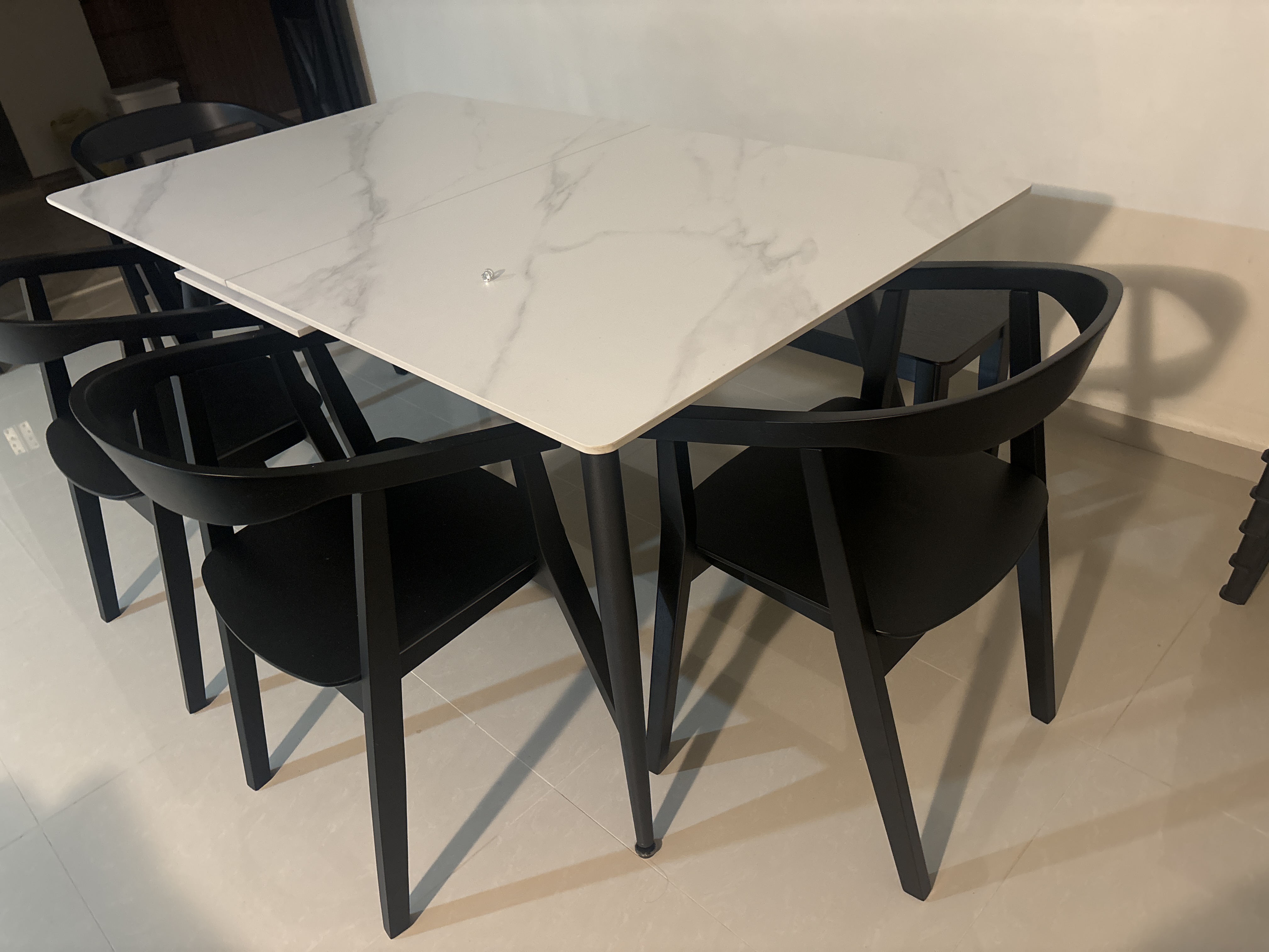 Customer home photo 2: Solid dining table.
Love the white and black combination.