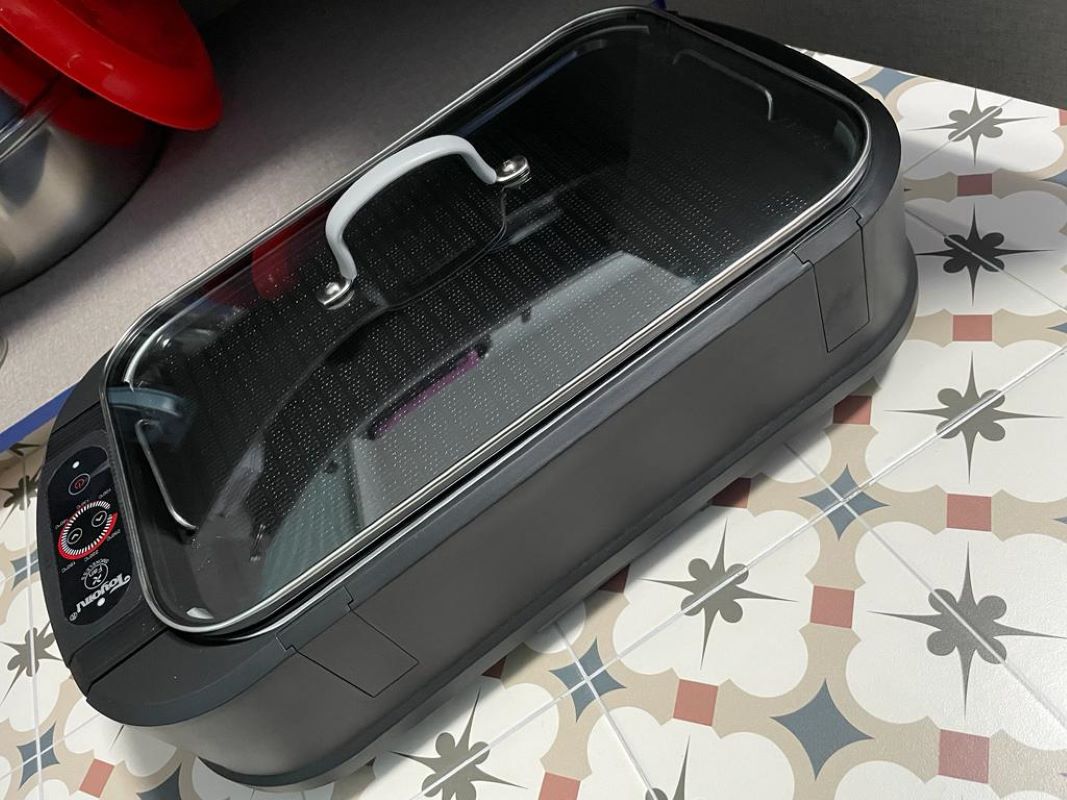 Customer home photo 1: I've used this smokeless grill multiple times. Easy to use and clean. Even brought it to a friend's house to use. Very impressive smokeless grill, doesn't make the house smoky unlike the regular electric grills that I have.