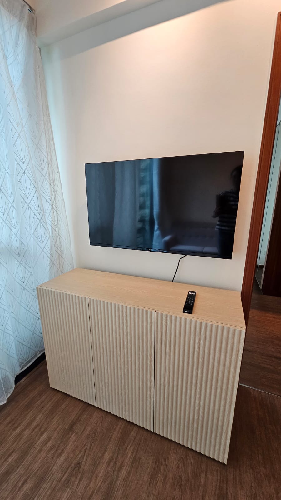 Customer home photo 66: I love this cabinet which is perfect for my 43 inch TV.  The wood feels sturdy and the installer from GoGo max did a great job.