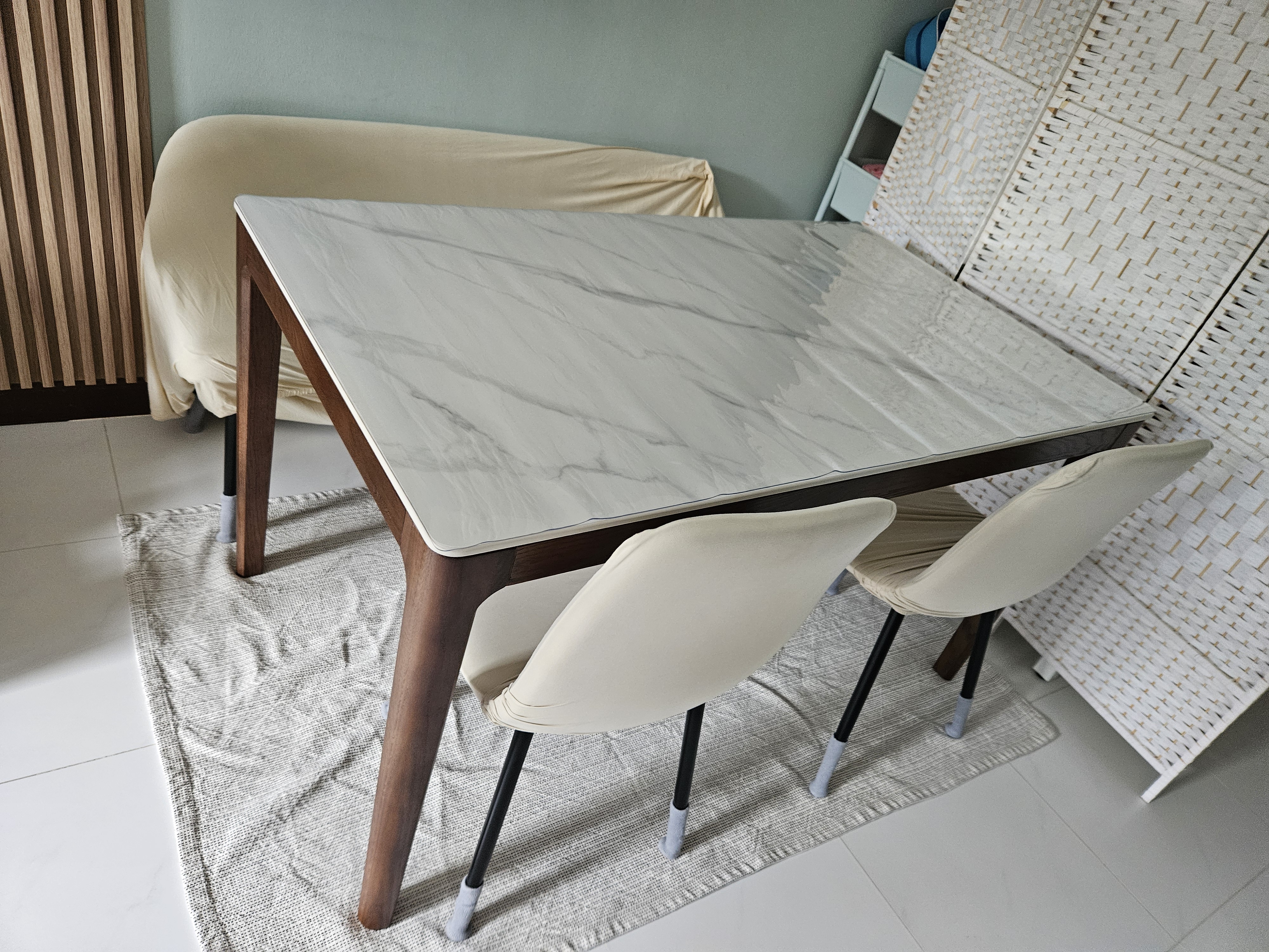 Customer home photo 14: Nice walnut table leg and matte sintered stone table. #Rayaready