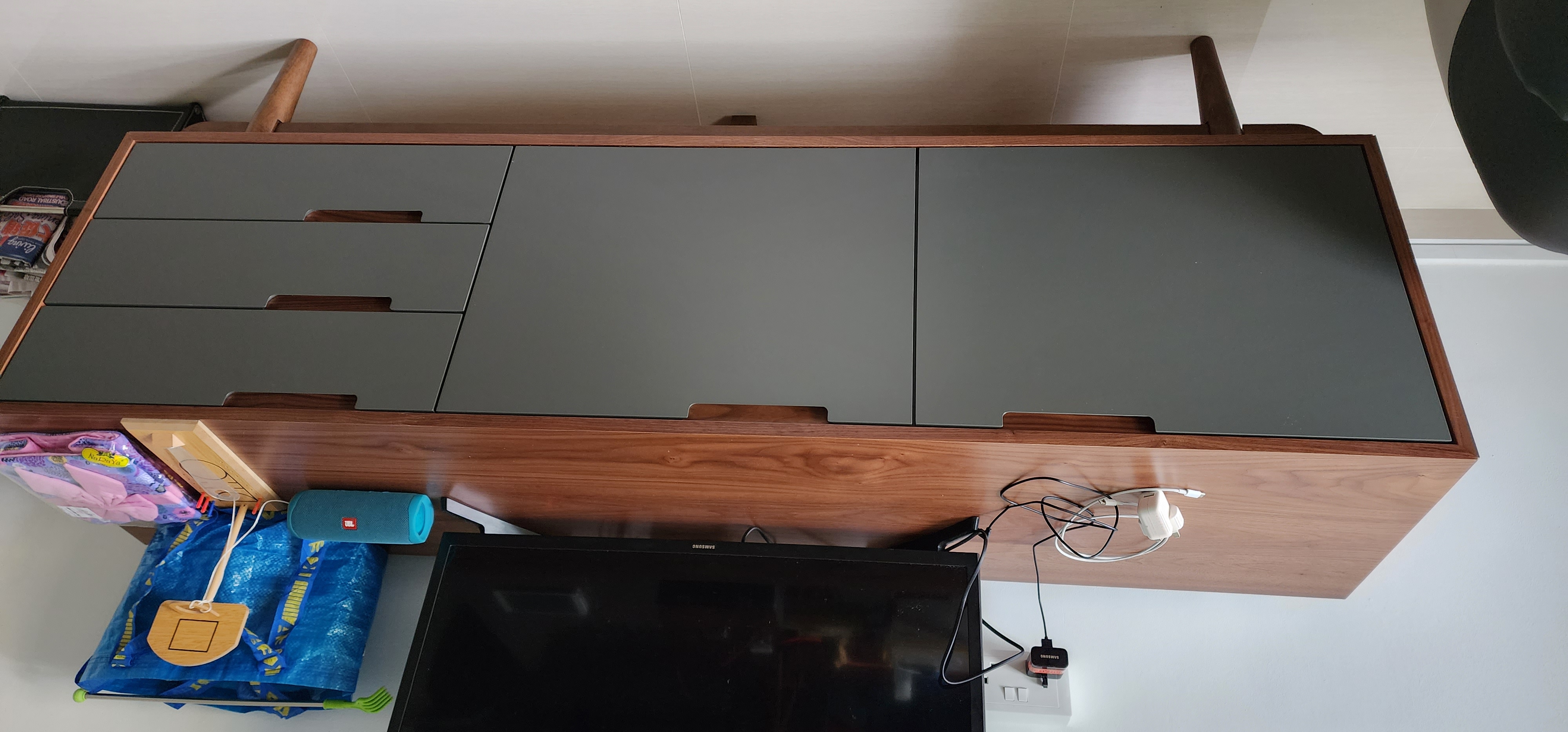 Customer home photo 1: Is a nice sideboard,Is what I'm looking for ,sideboard is higher then TV console is a perfect height to place your TV ,the finishing is good.the customer service took my complaint which the 1st sideboard front is defective and they replace a new piece. I'm happy with HipVan. Will recommend to friends.