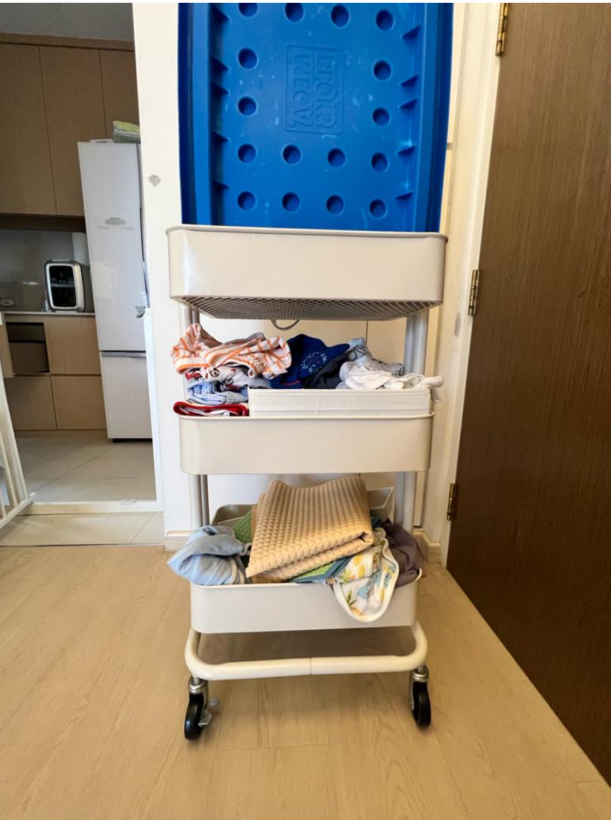 Customer home photo 9: Love this trolley to put baby's clothes etc. Kudos to the recovery service team where one of the pole edges cannot be sloted in properly due to workmanship. To my surprise, they returned to me with the trolley completely fixed up which I appreciate instead of me having to fix it up myself.